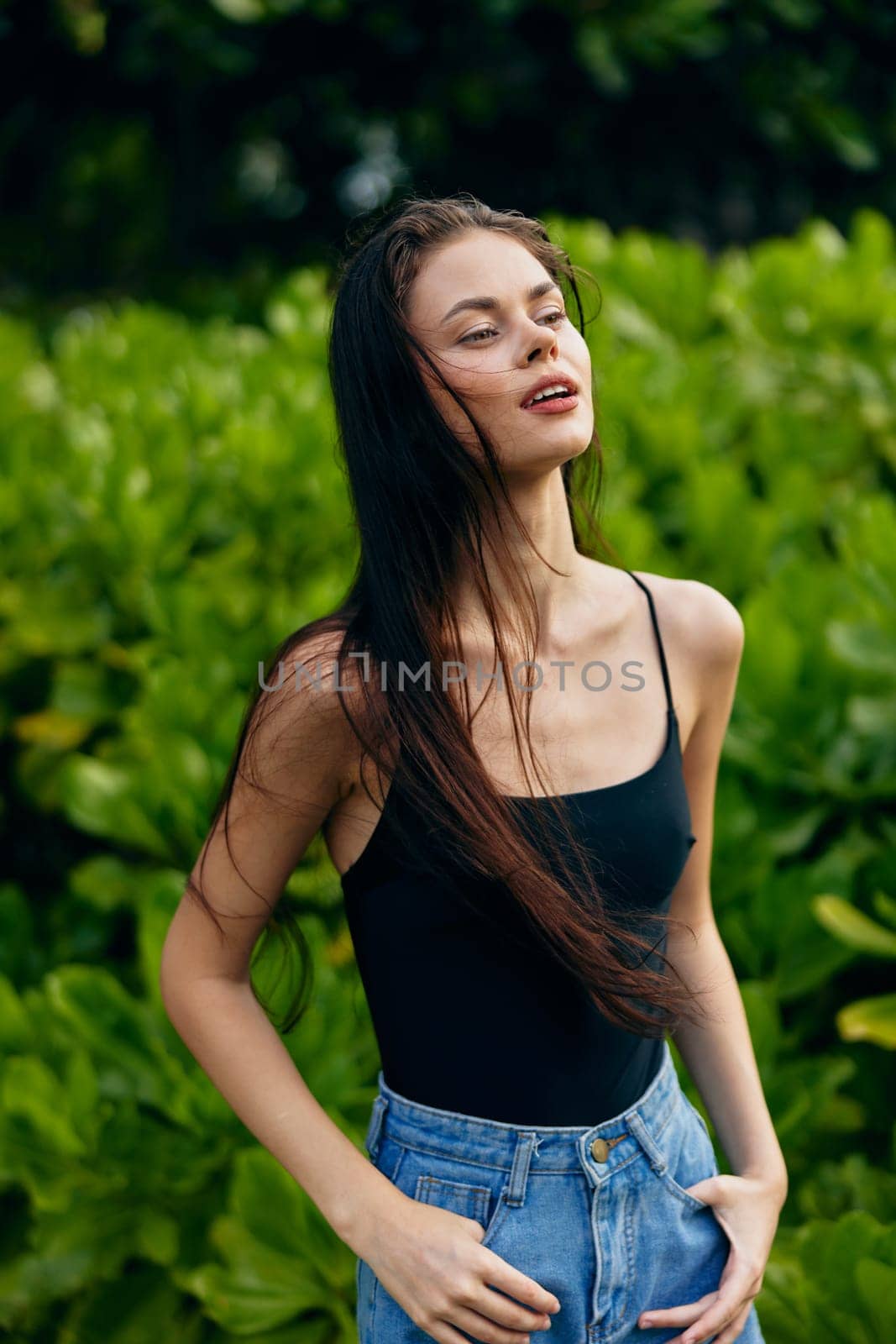 woman sunny t-shirt bag hair bali long lifestyle beautiful park natural happiness summer quiet sunset fashion walk smiling nature smile portrait freedom