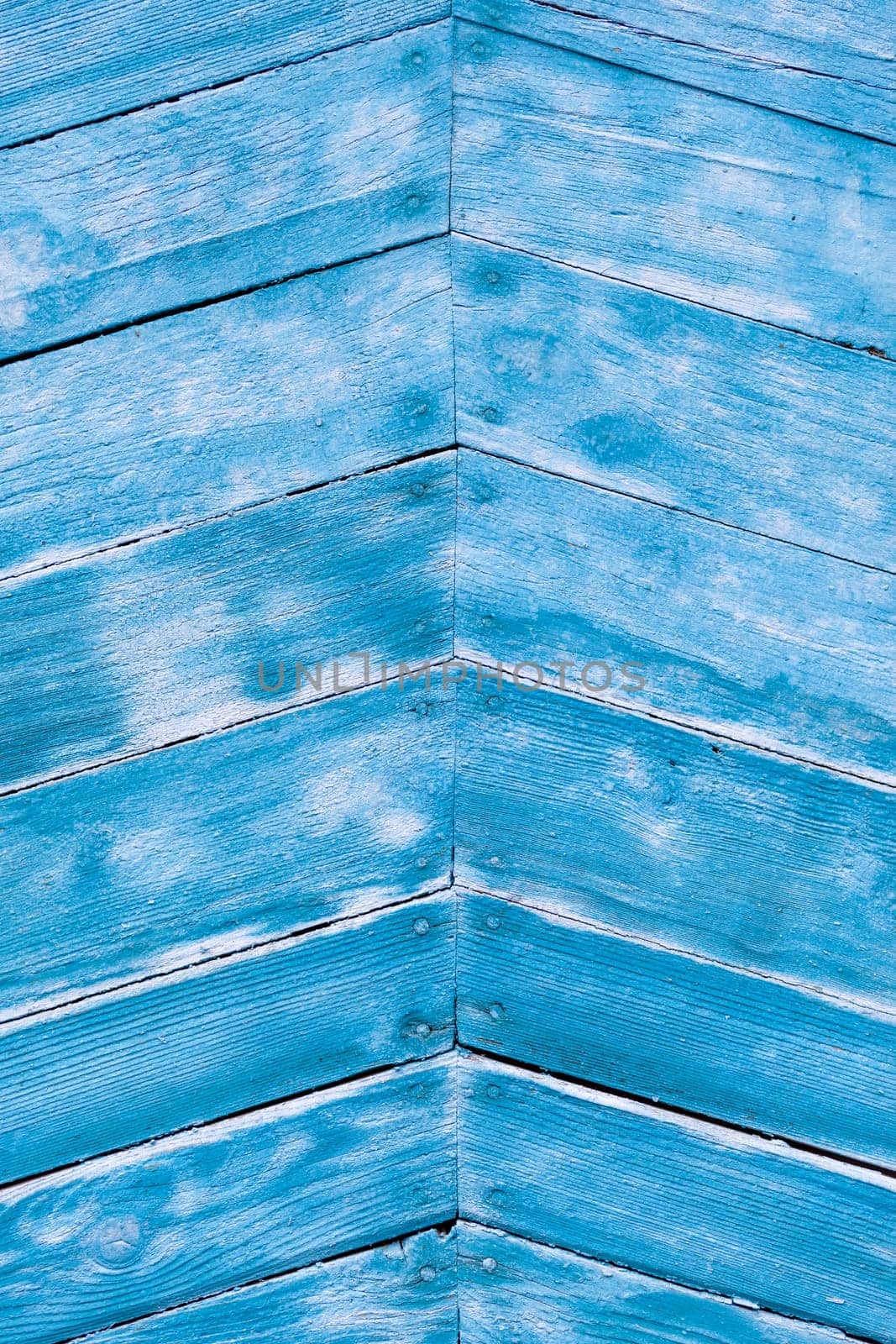 Wood texture with blue flaked paint. Peeling paint on weathered wood by AnatoliiFoto