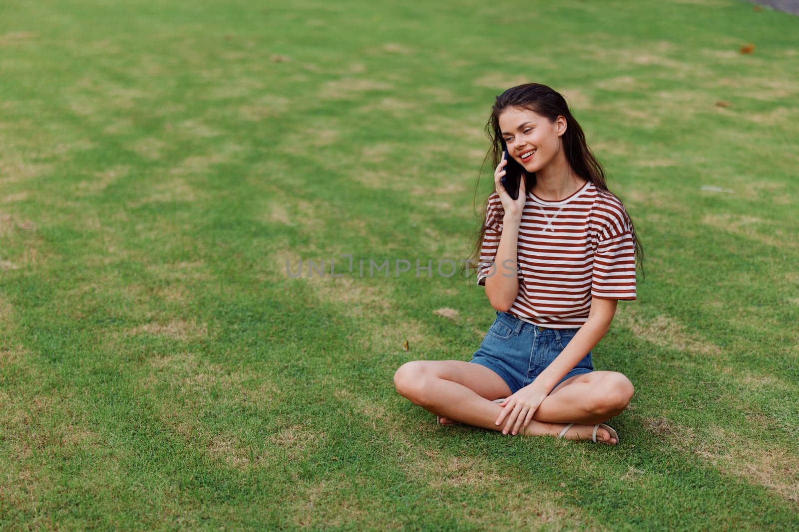 happy woman park lifestyle palm smiling grass nature phone blogger using tree by SHOTPRIME