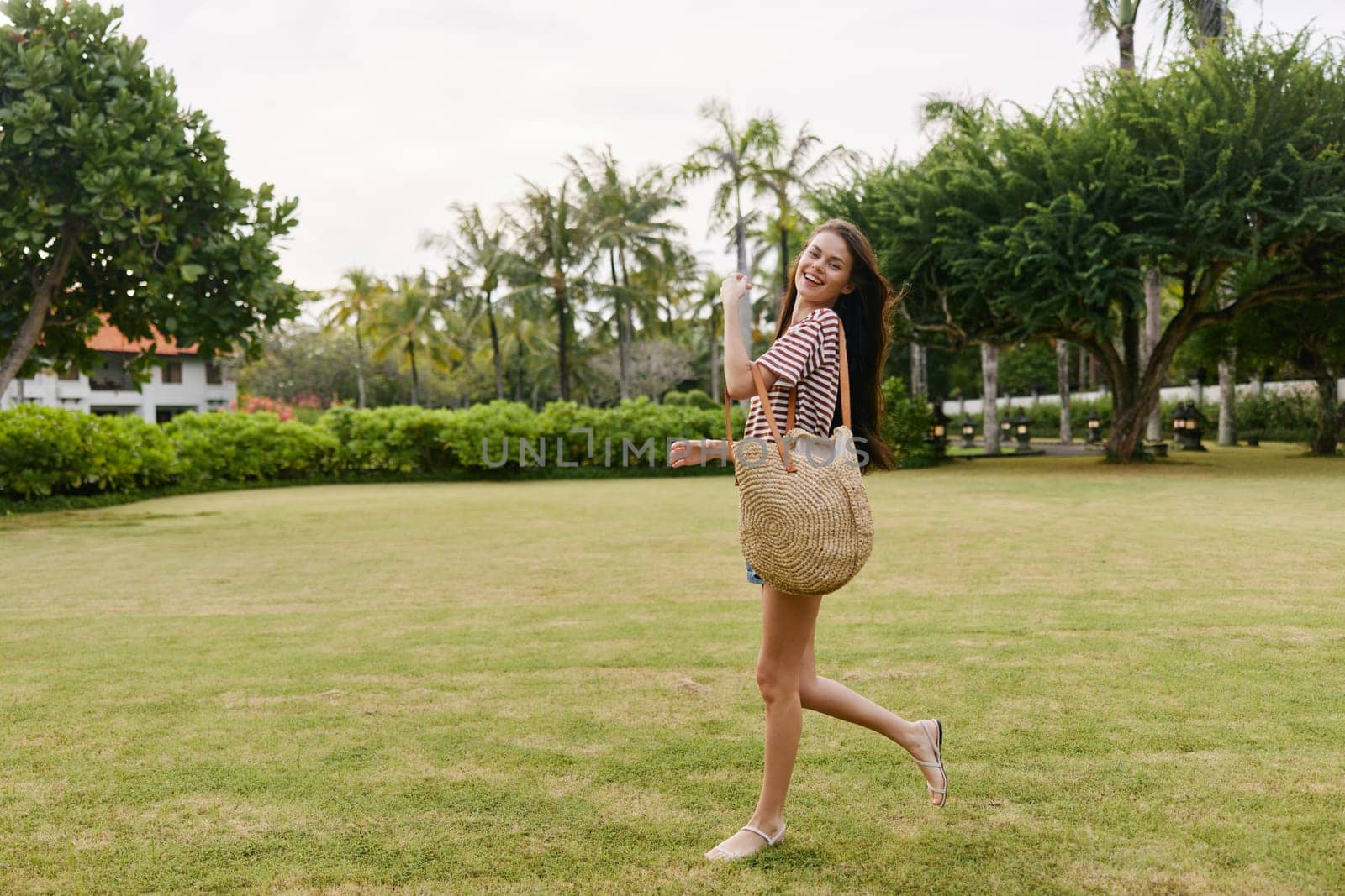 hat woman park walk girl nature walking happiness striped t-shirt lifestyle beautiful meditation day smile smiling sun relax freedom portrait summer