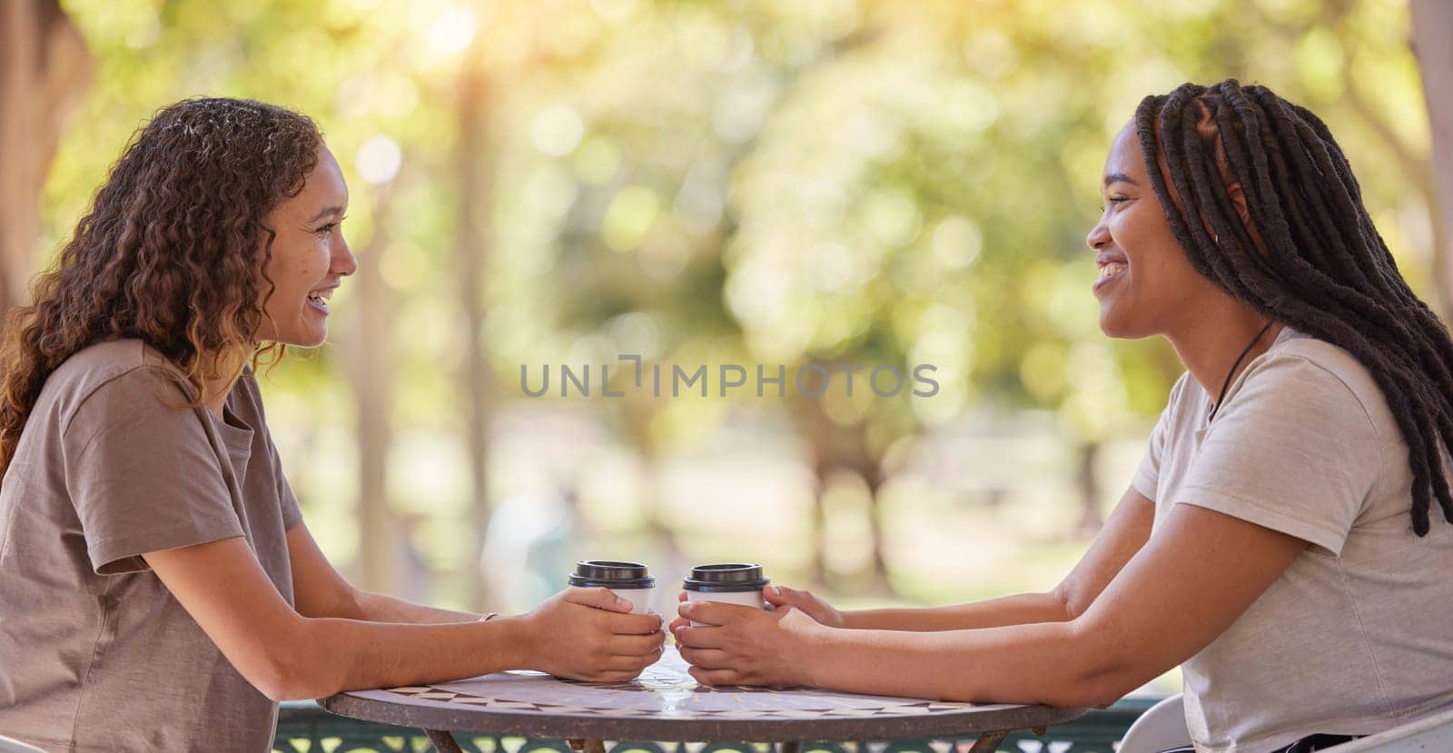 Woman, friends and conversation with coffee at cafe for social life, catchup or communication outside. Happy women enjoying friendly discussion, talk or gossip together in friendship at coffee shop.