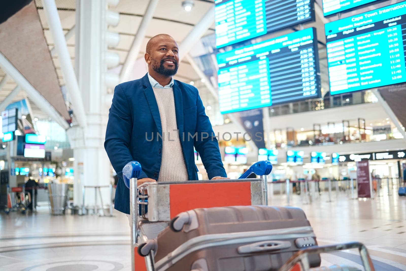 Luggage trolley, airport and travel man with international vacation, holiday or immigration for global opportunity. Suitcase, walking with baggage and african person happy for flight transportation.