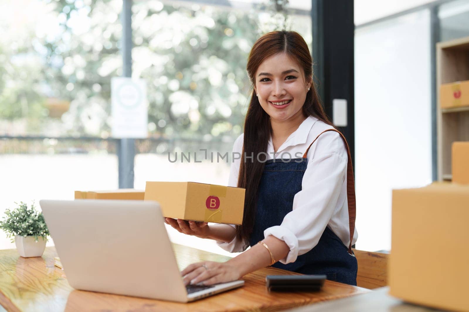 Small businesses SME owners female entrepreneurs working with parcel, e-business, marketing, online shop, sme, entrepreneurs.
