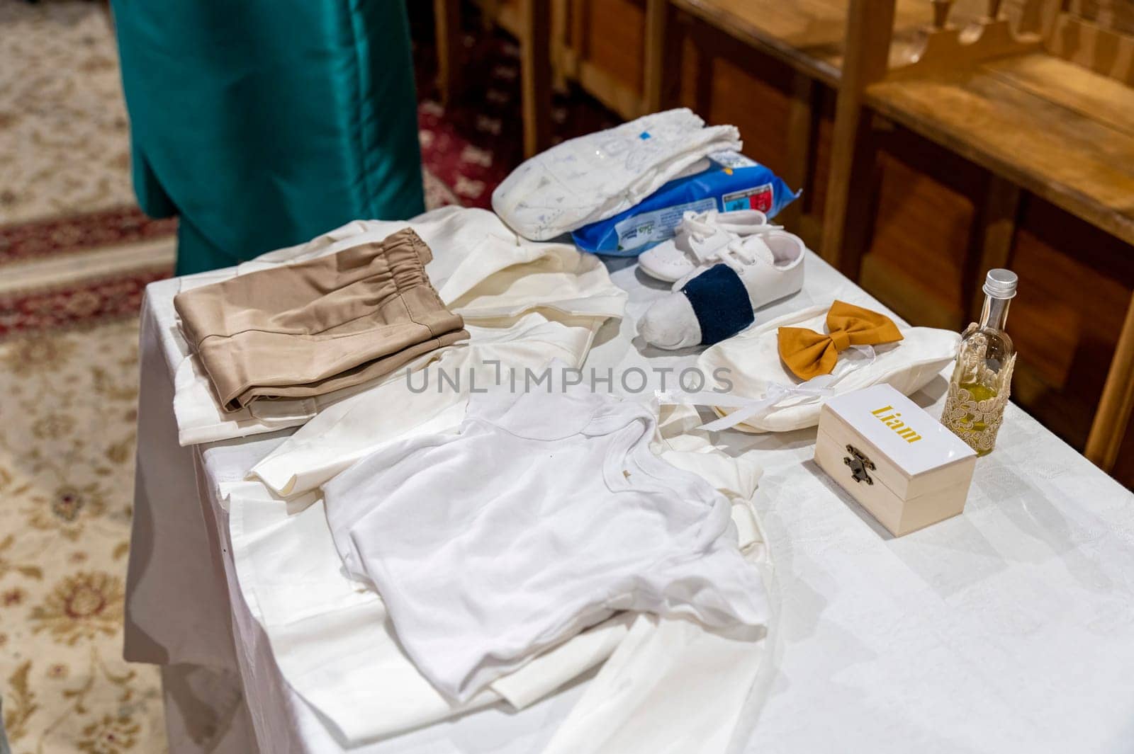 a table with items for an Orthodox baptism by carfedeph