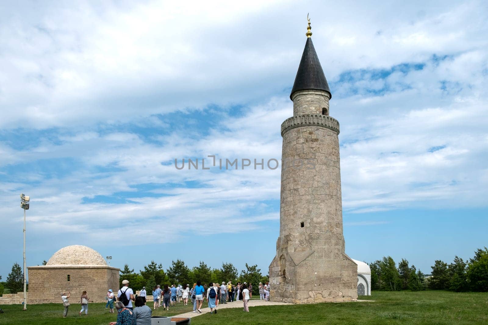 Bolgar, Historical and architectural reserve, Tatarstan, Russia - May 24, 2023. Khan's tomb and mosque, ancient buildings of the 14th century. Tourism, historical heritage. Selective focus.