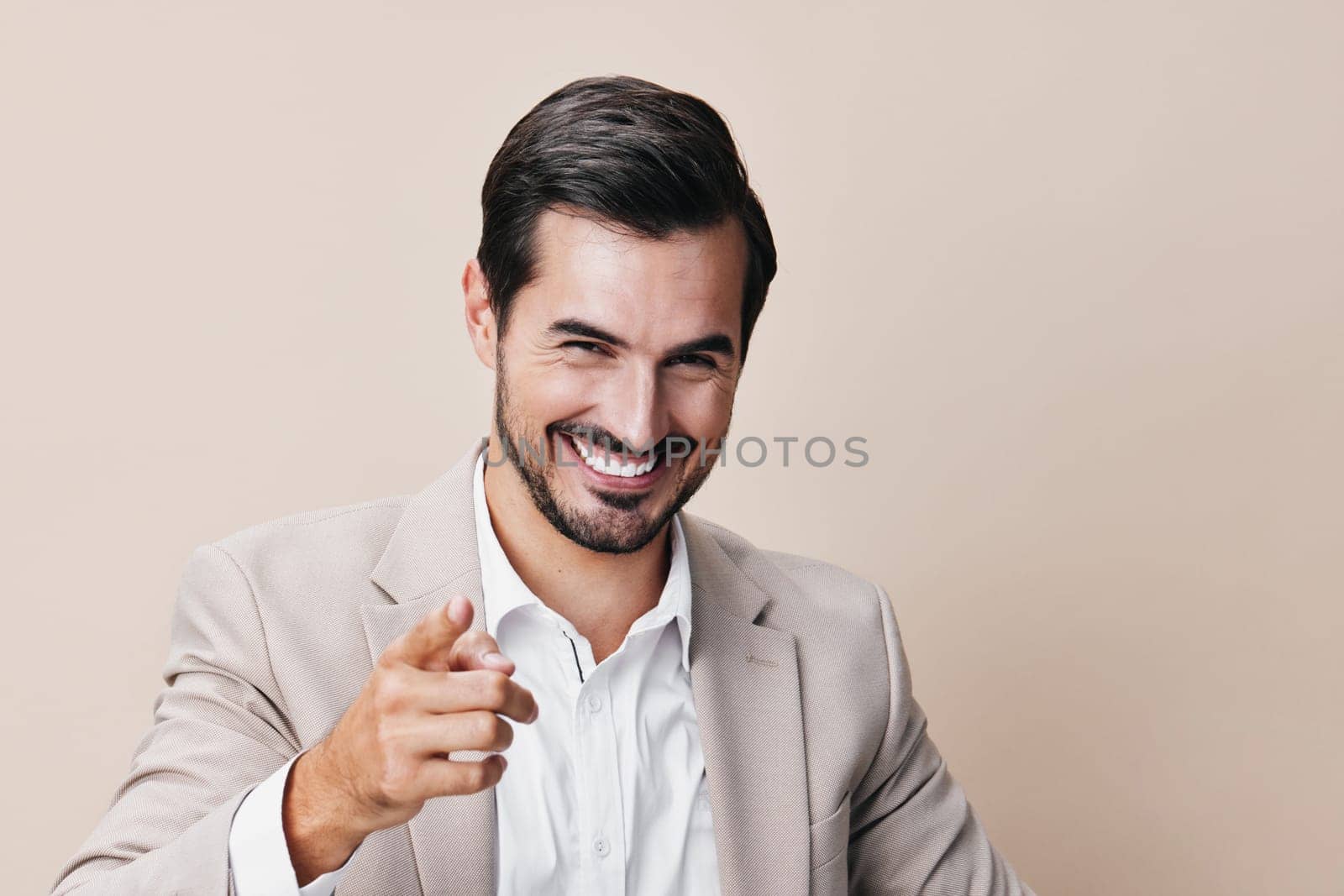 hand man business beige businessman happy suit winner arm smiling victory by SHOTPRIME