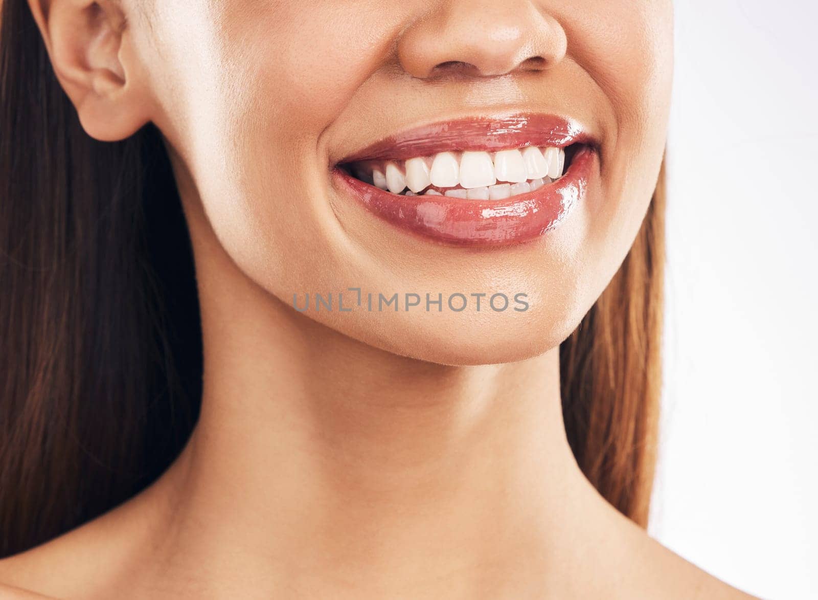 Woman, mouth and teeth with dental and smile, happiness with beauty and oral hygiene isolated on white background. Health, wellness and happy female model, orthodontics and lips with shine in studio.