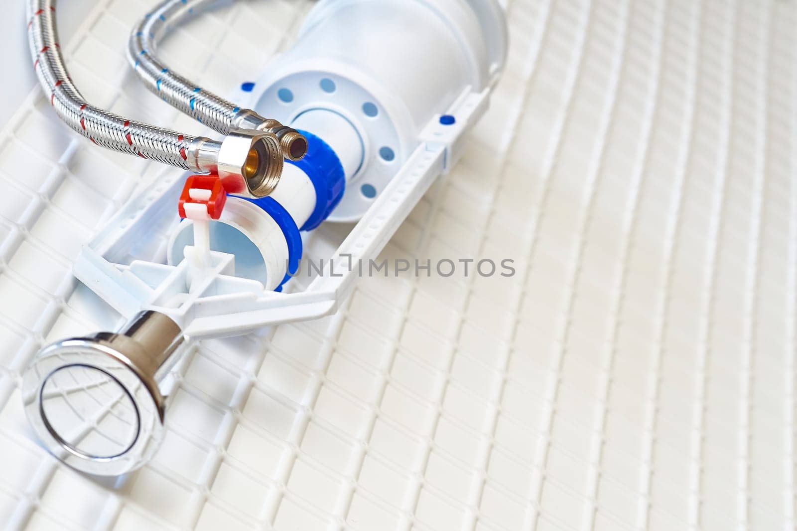 the system of pipes, tanks, fittings, and other apparatus required for the water supply, heating, and sanitation in a building