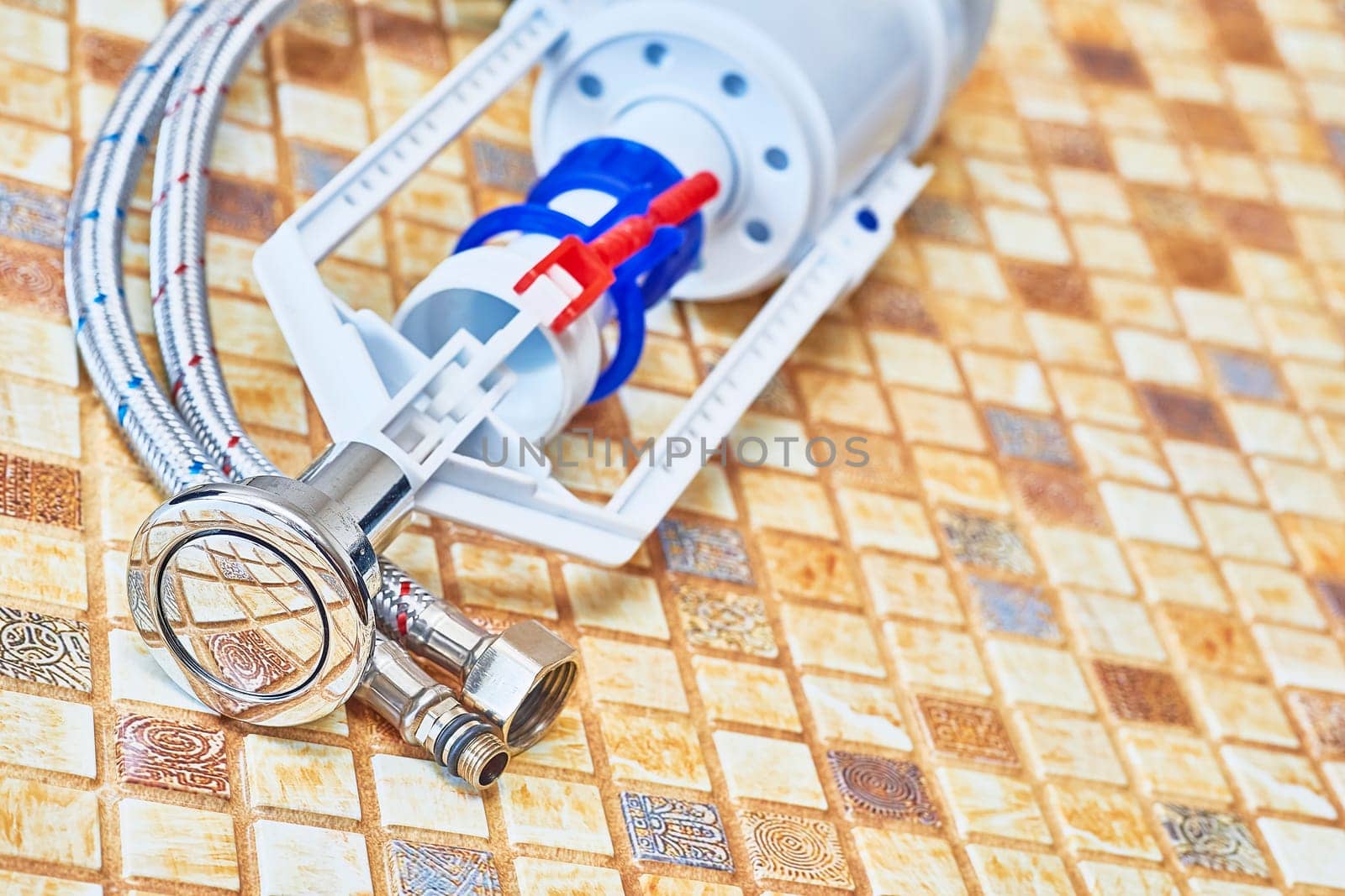 the system of pipes, tanks, fittings, and other apparatus required for the water supply, heating, and sanitation in a building