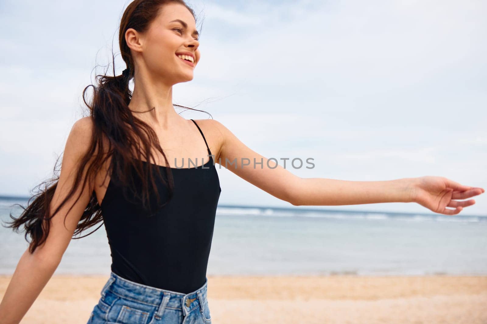 woman walking travel beach lifestyle running summer sunset young smile sea by SHOTPRIME
