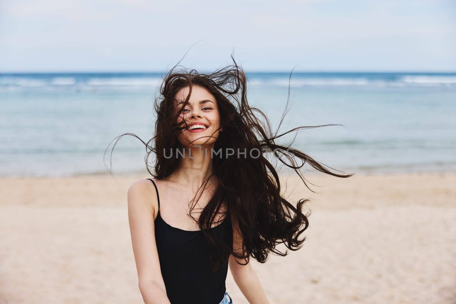 woman smiling young travel sunset summer smile lifestyle running sea beach by SHOTPRIME