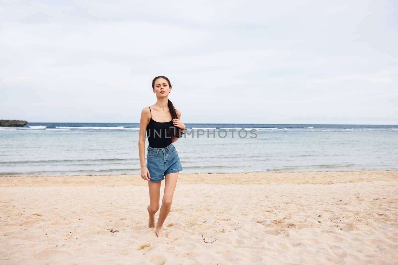 beach woman lifestyle sea tan sunset young travel running summer smile by SHOTPRIME