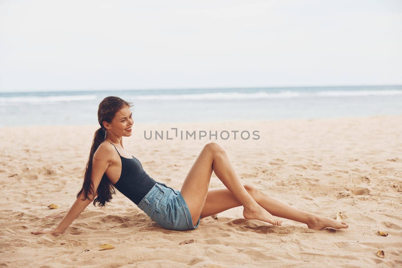 sea woman beach vacation freedom sand smile holiday nature sitting travel by SHOTPRIME