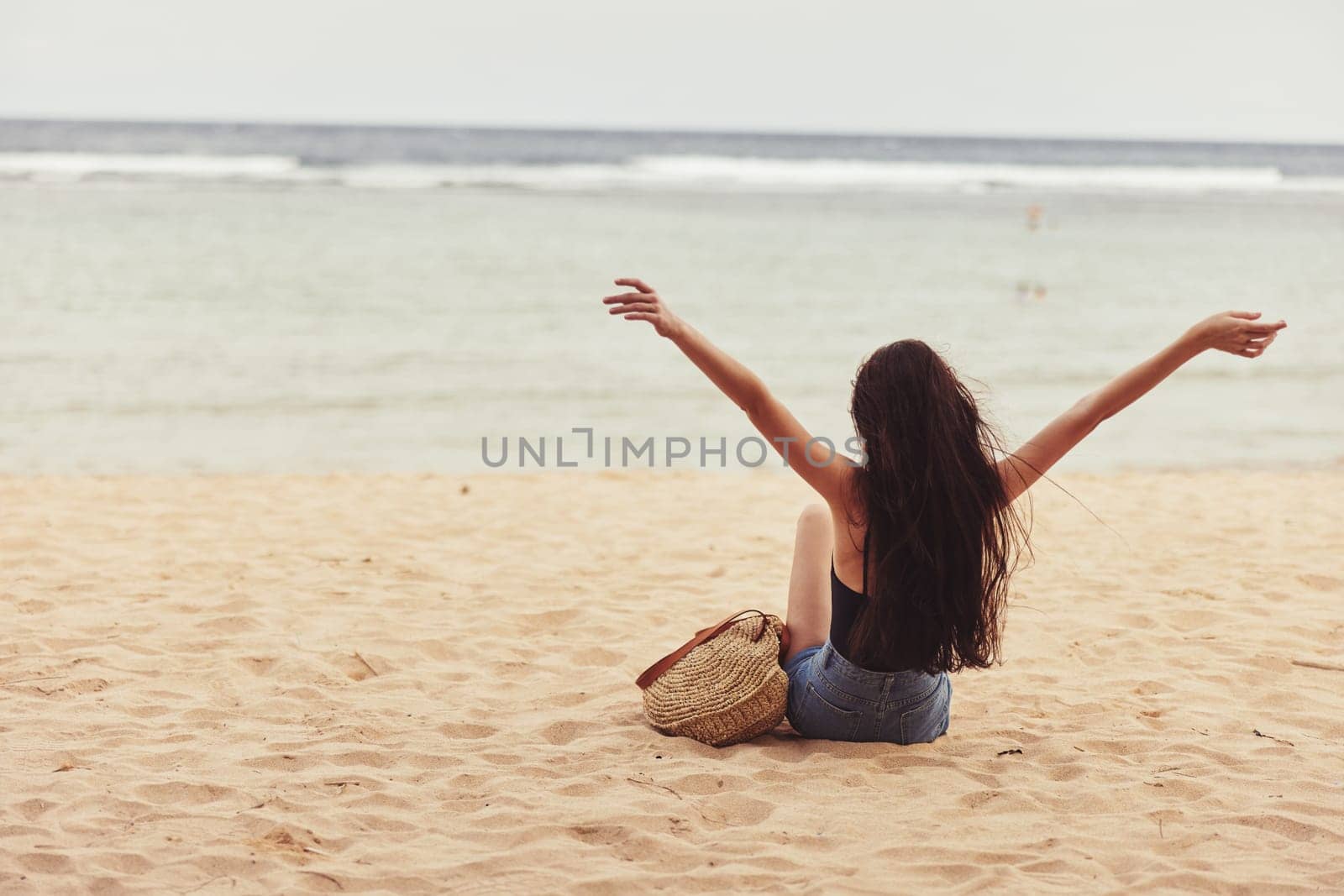sand woman view back vacation sea freedom sitting smile nature beach travel by SHOTPRIME