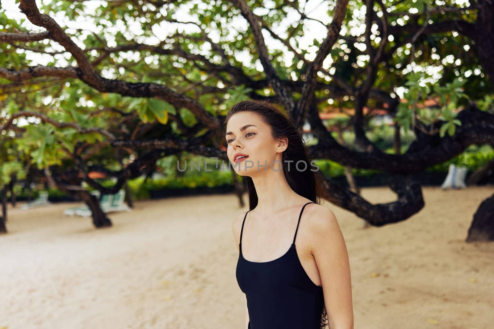 woman shore sand outdoor copy-space smiling sea vacation summer freedom relax copy space young person ocean sun smile walking nature beach caucasian