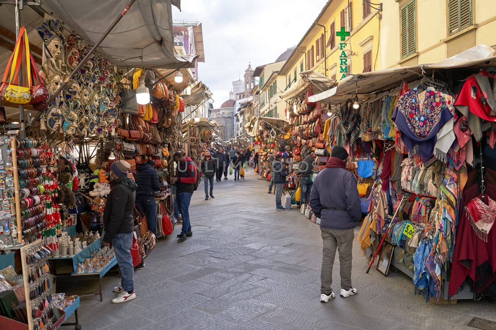 06 Dec, 2021 - Florence, Italy. San Lorenzo Street Market with many lether goods such as belts, bags, and wallets on display