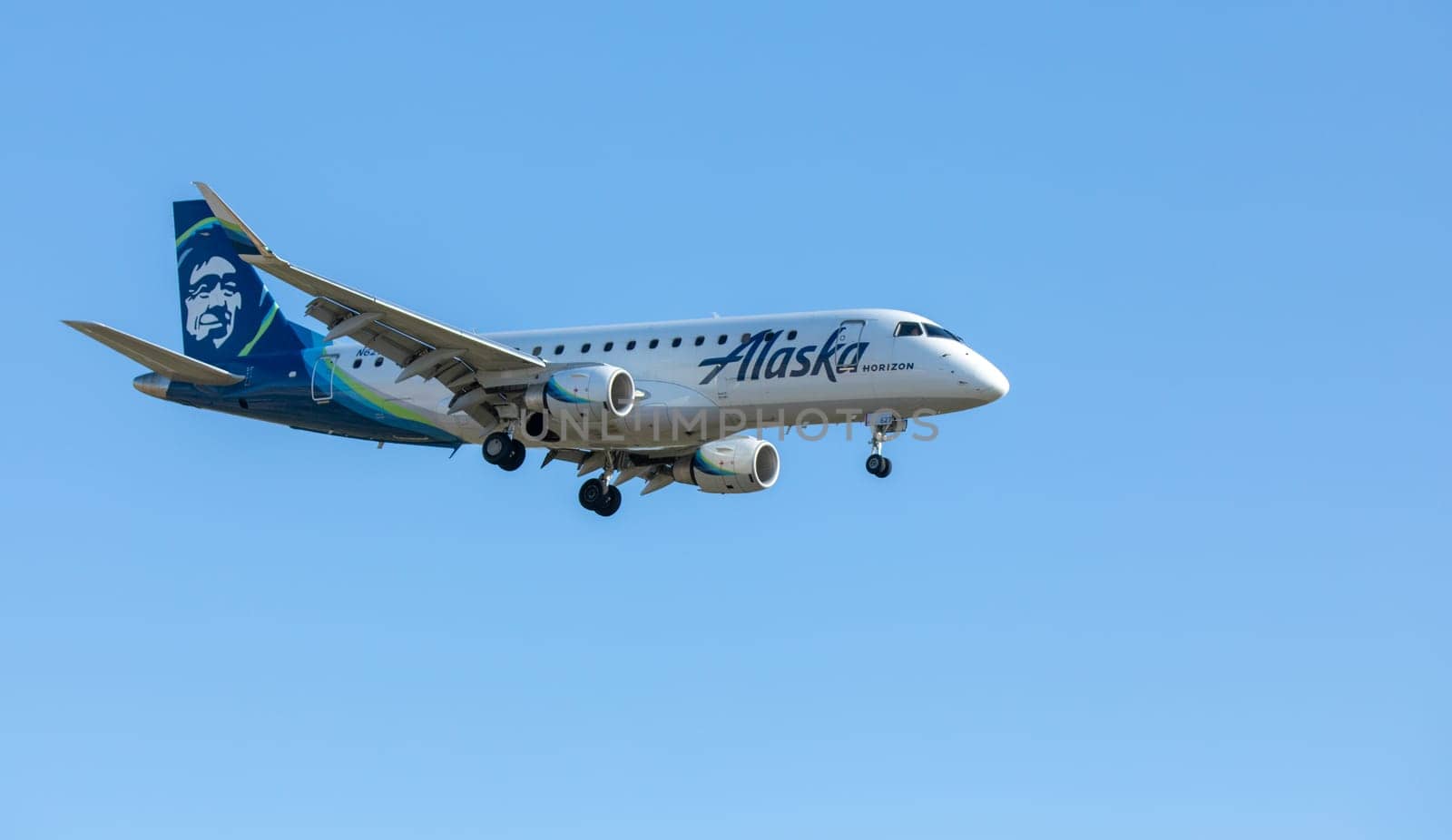 Boise, Idaho - May 23, 2022: Horizon flying as Alaskan airlines flight landing at Boise Airport in Idaho