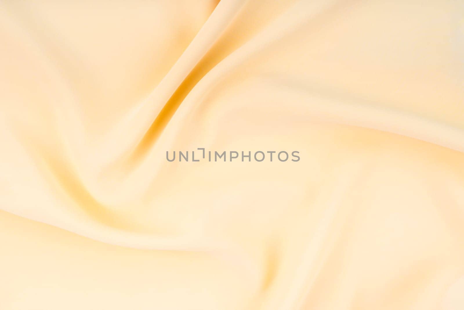 The Beautiful light yellow color silk texture as background. by Gamjai