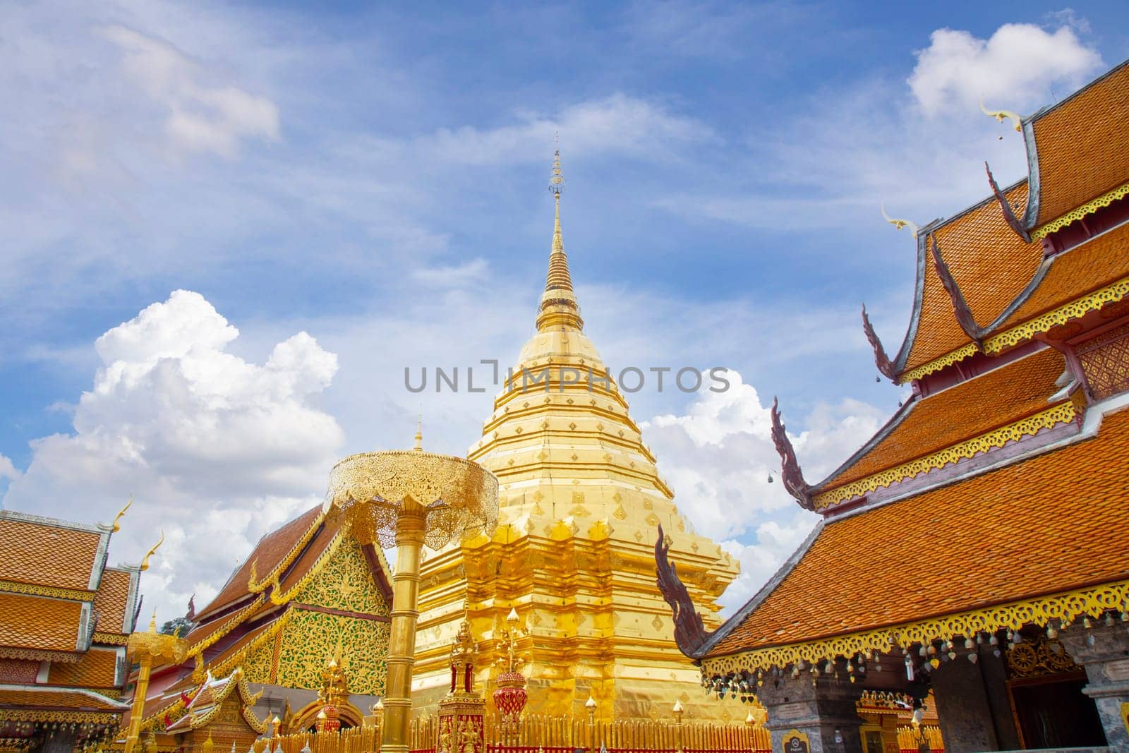 Golden pagoda Wat Phra That Doi Suthep in Chiang Mai, Thailand. by Gamjai
