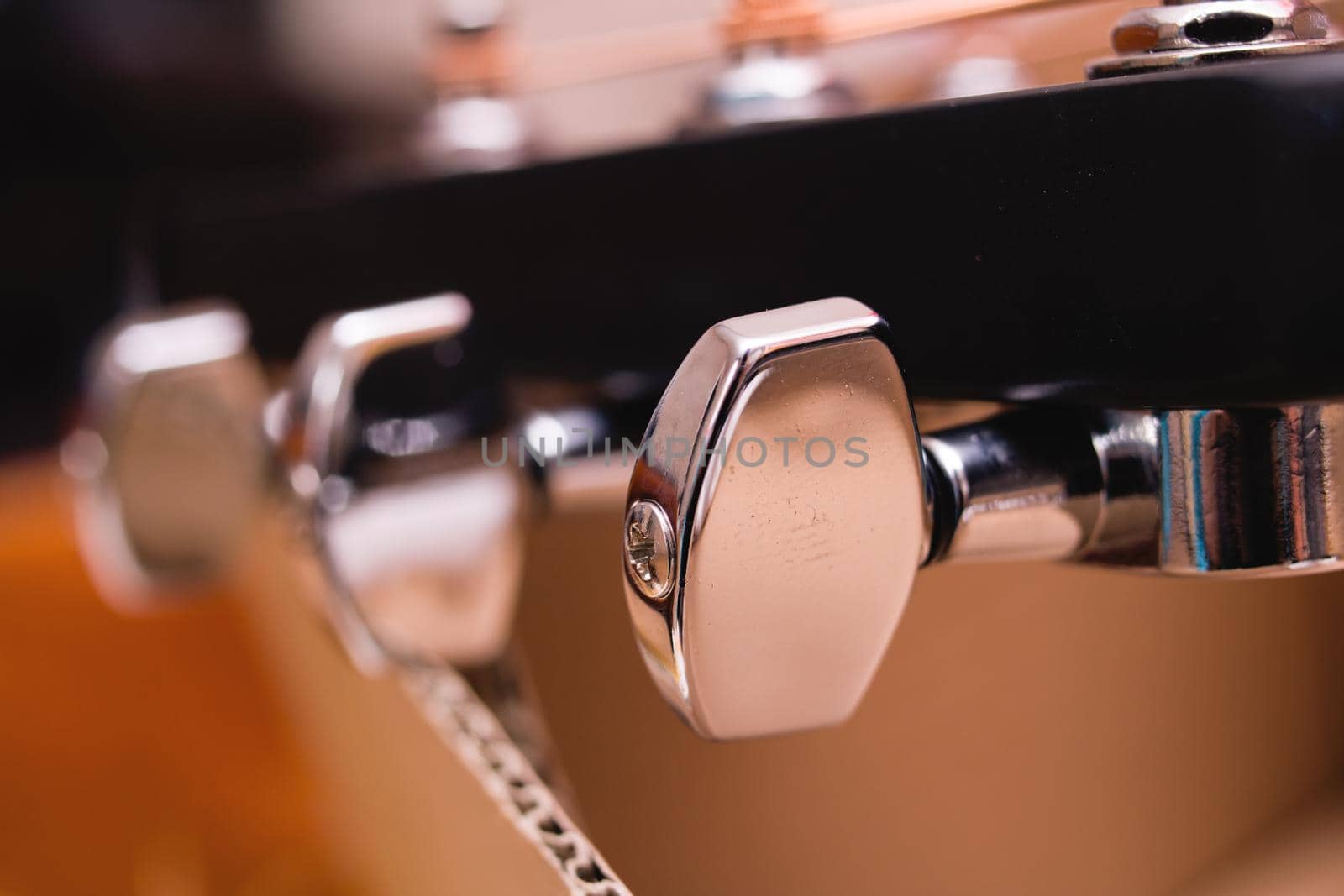 Black and yellow guitar strings close up macro photography