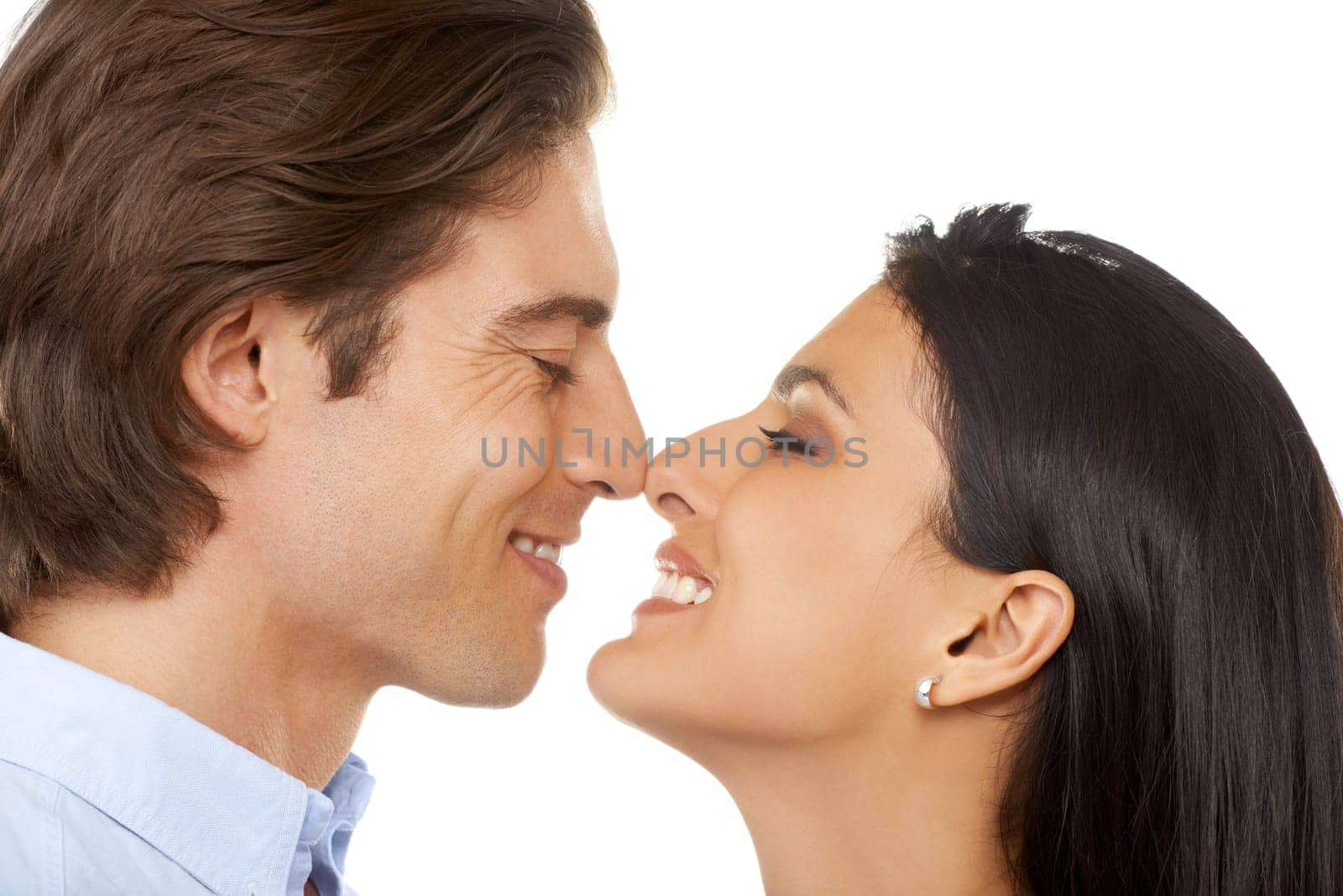 Couple, nose and smile for love or valentines day date in affection isolated against white studio background. Closeup of man and woman smiling touching faces in happiness for special month of romance.