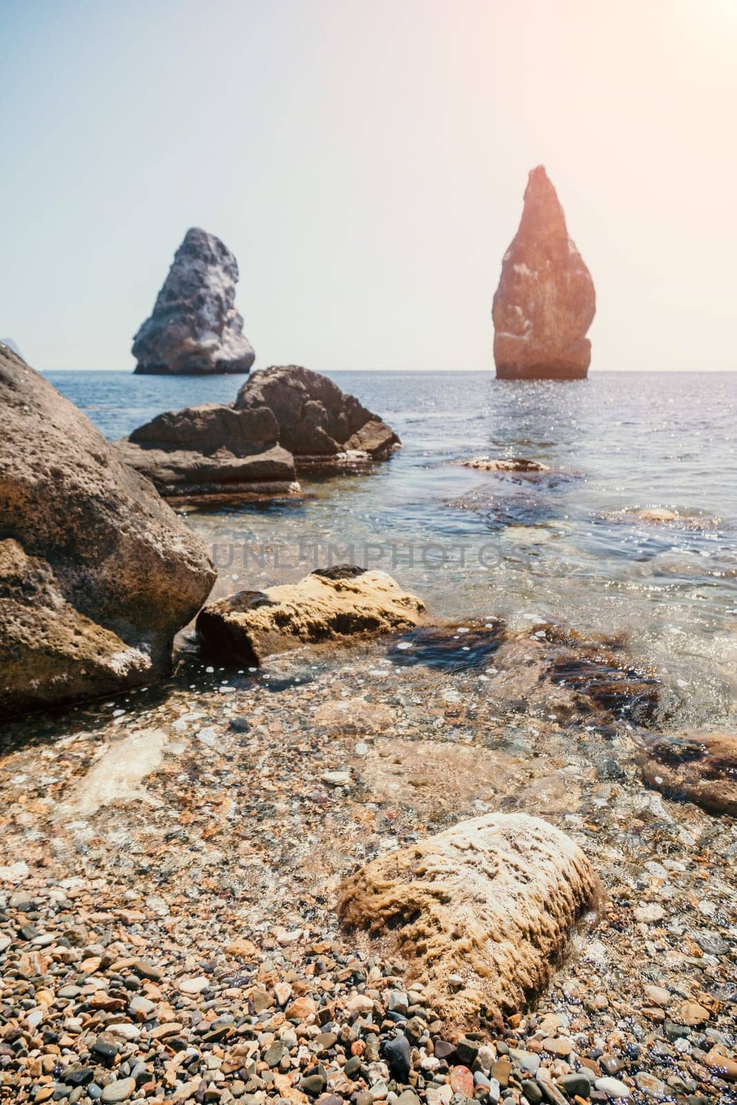 Aerial panoramic view of beautiful sunset above sea. Beautiful seascape. Sun glare, small waves on the water surface. Evening. Horizon. Nobody. No people. Copy space. Never-ending beauty of nature