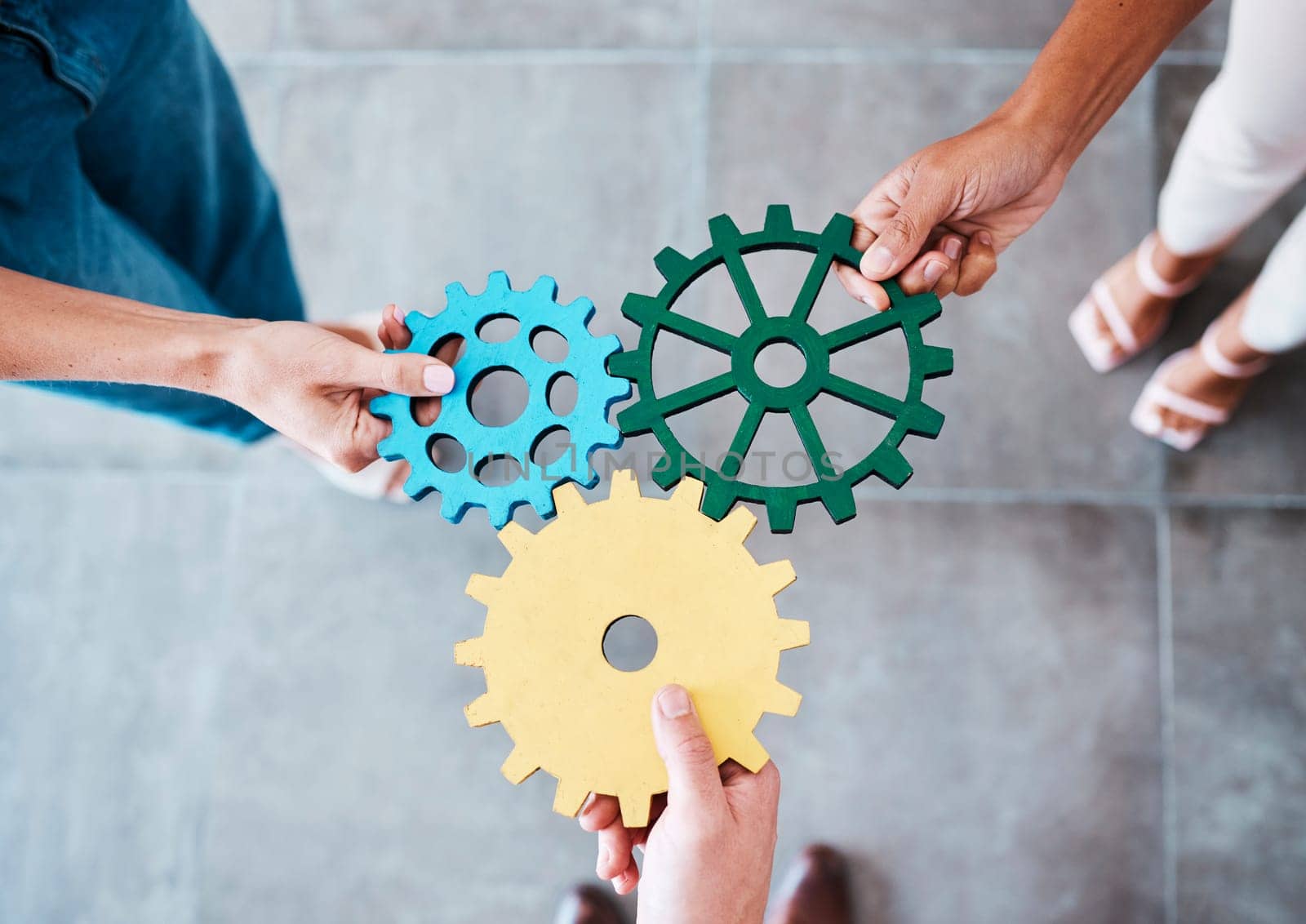 Settings, gear icon and teamwork with business people or team together for collaboration and synergy with cog wheel strategy. Office group hands for problem solving, innovation and development.