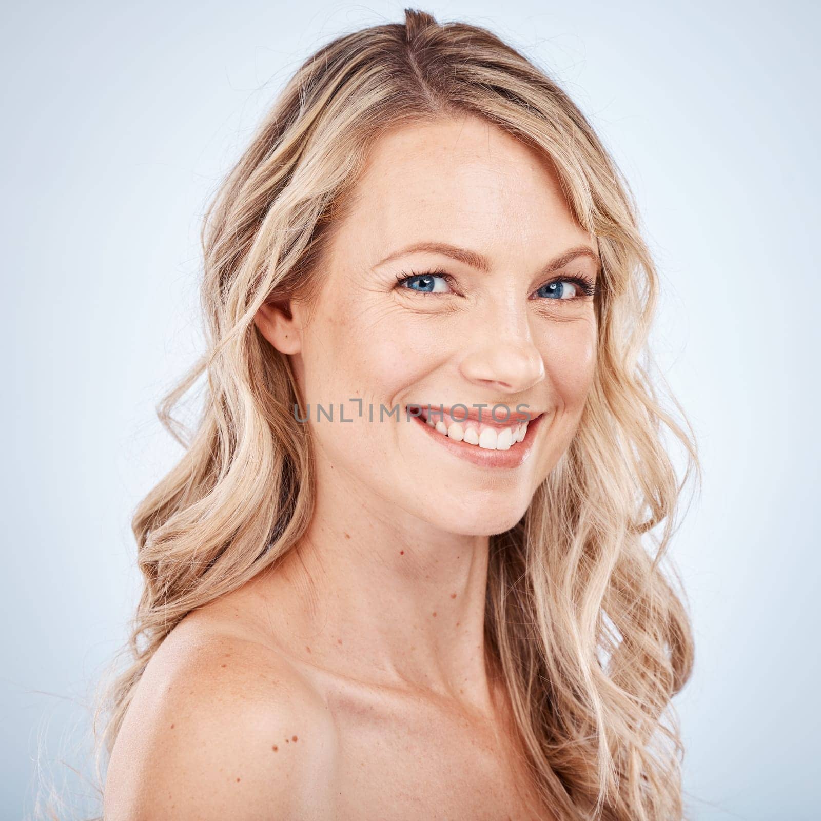 Beauty, skincare and hair care wellness of a woman happy about salon or facial treatment. Portrait of a model face smile with happiness about healthy hairstyle, balayage and cosmetic dermatology.