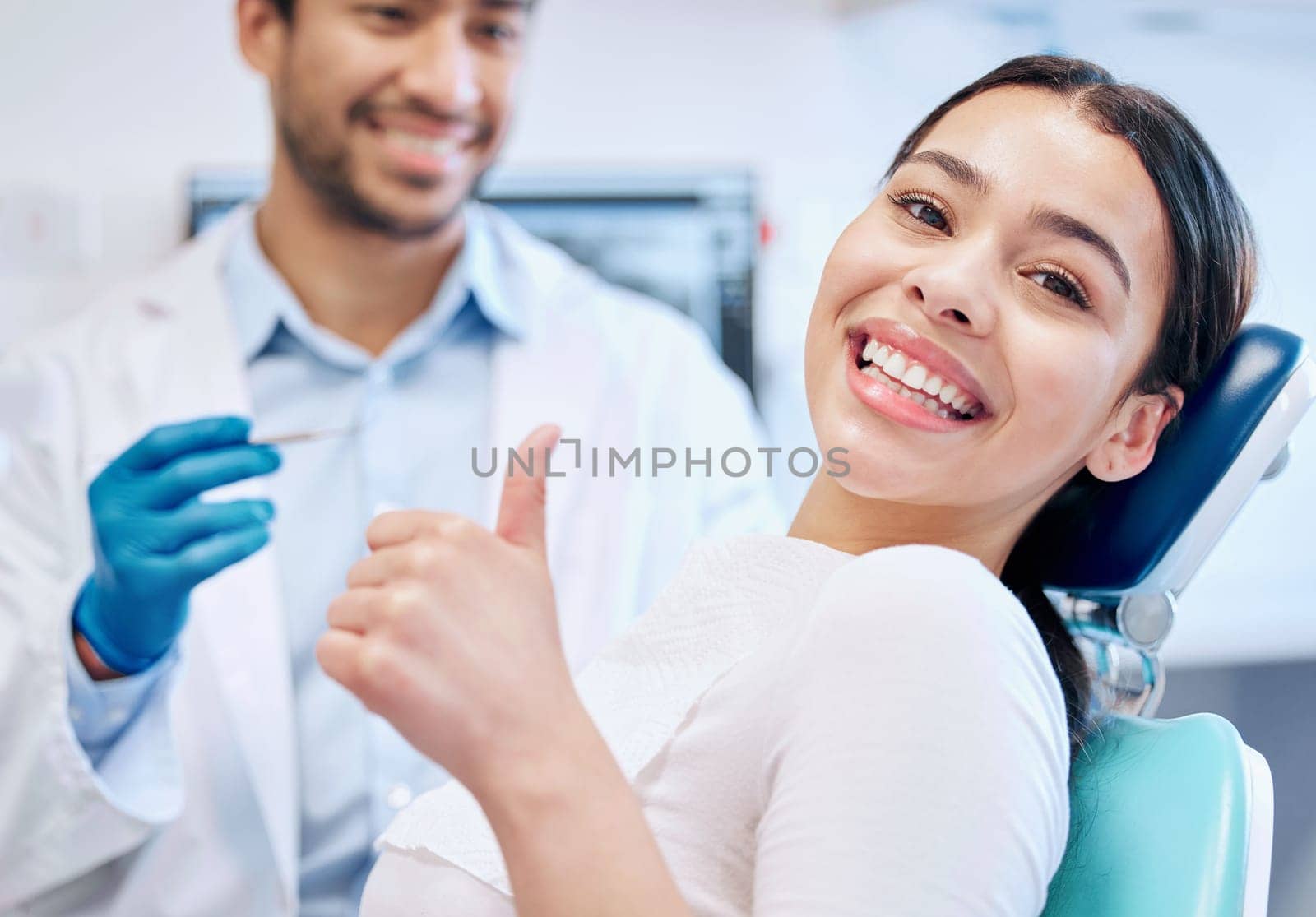 Happy, thumbs up and portrait of dentist and patient for teeth whitening, service and dental care. Healthcare, dentistry and hand sign of orthodontist and woman for oral hygiene, wellness or cleaning.