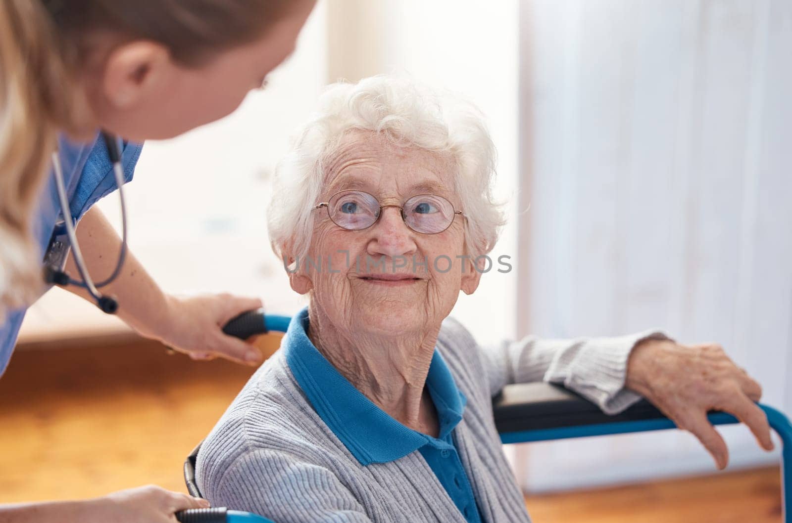 Disability, nursing and senior woman with a doctor for care, consultation and medical help at a hospital. Healthcare, communication and elderly patient in a wheelchair with a nurse in a home.