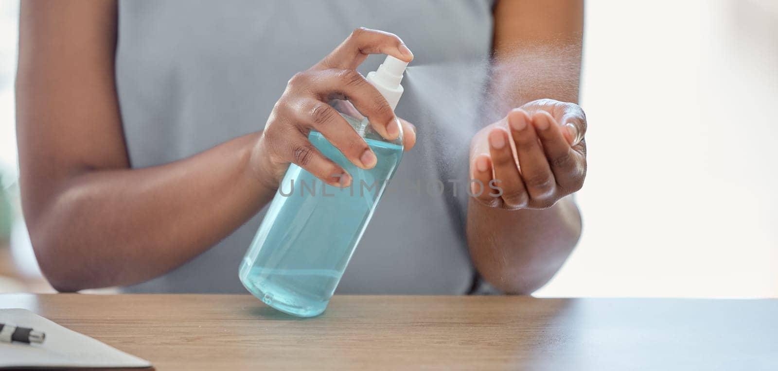 Hand sanitizer, business woman and covid risk management, healthcare or safety in office to stop corona virus, cleaning compliance and hygiene. Spray bottle, liquid and product of bacteria protection.