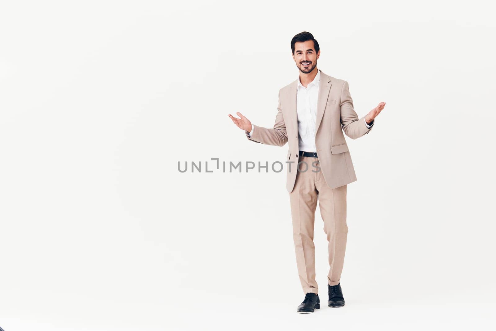 man standing model flying person adult smiling business happy winner office copyspace beige running male stylish confident suit jumping businessman victory