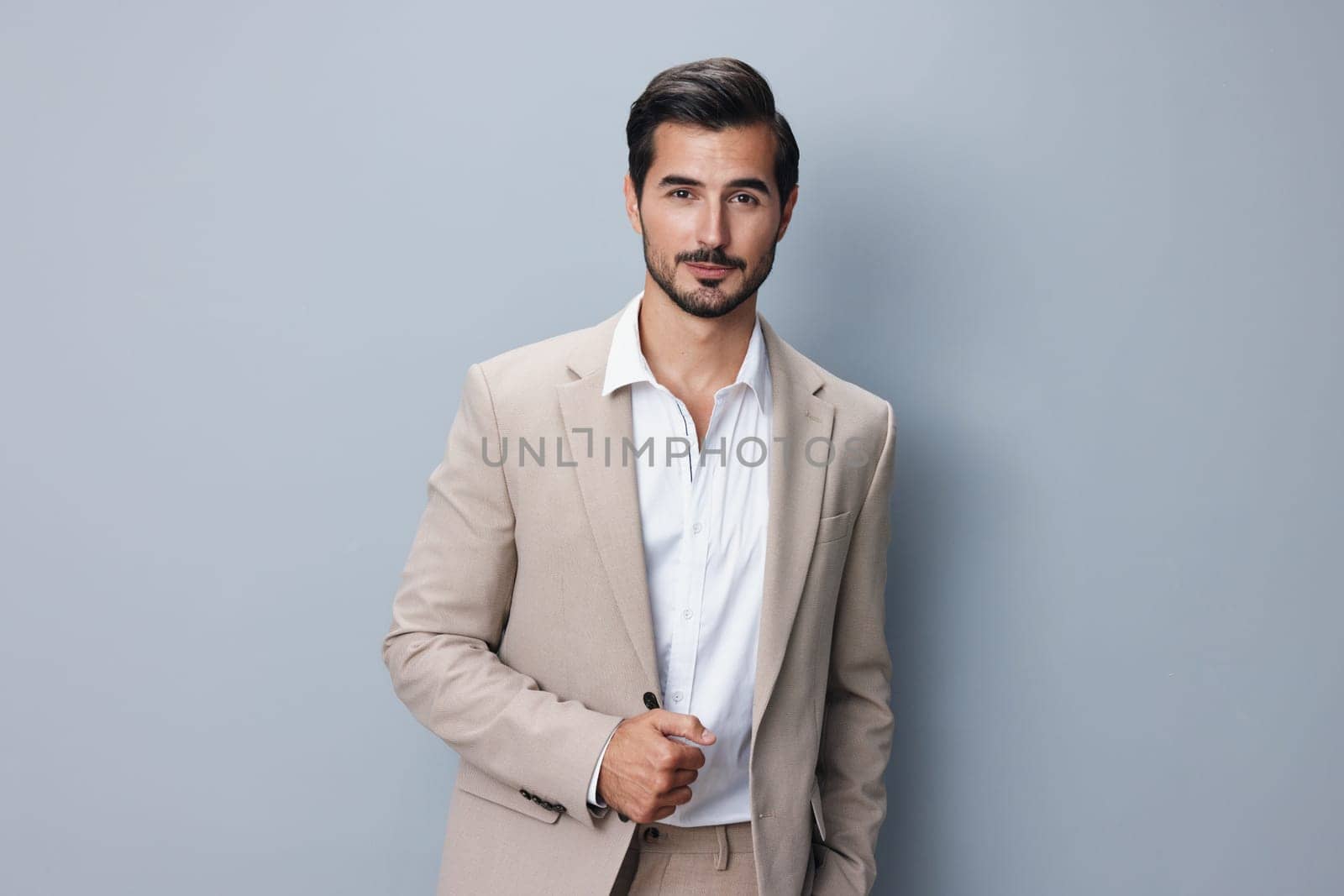 man smiling copyspace handsome business happy suit office beige portrait businessman by SHOTPRIME