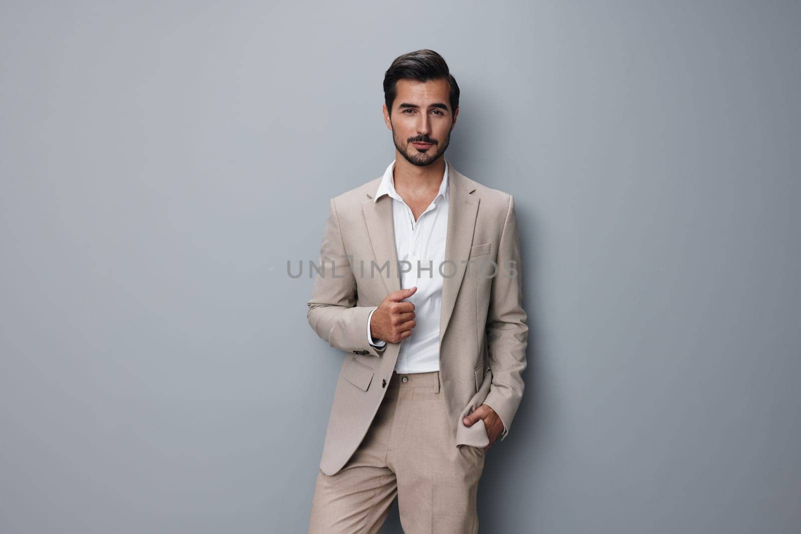 man white executive smiling suit beige arm copyspace formal happy business sexy male person portrait businessman handsome studio isolated confident successful