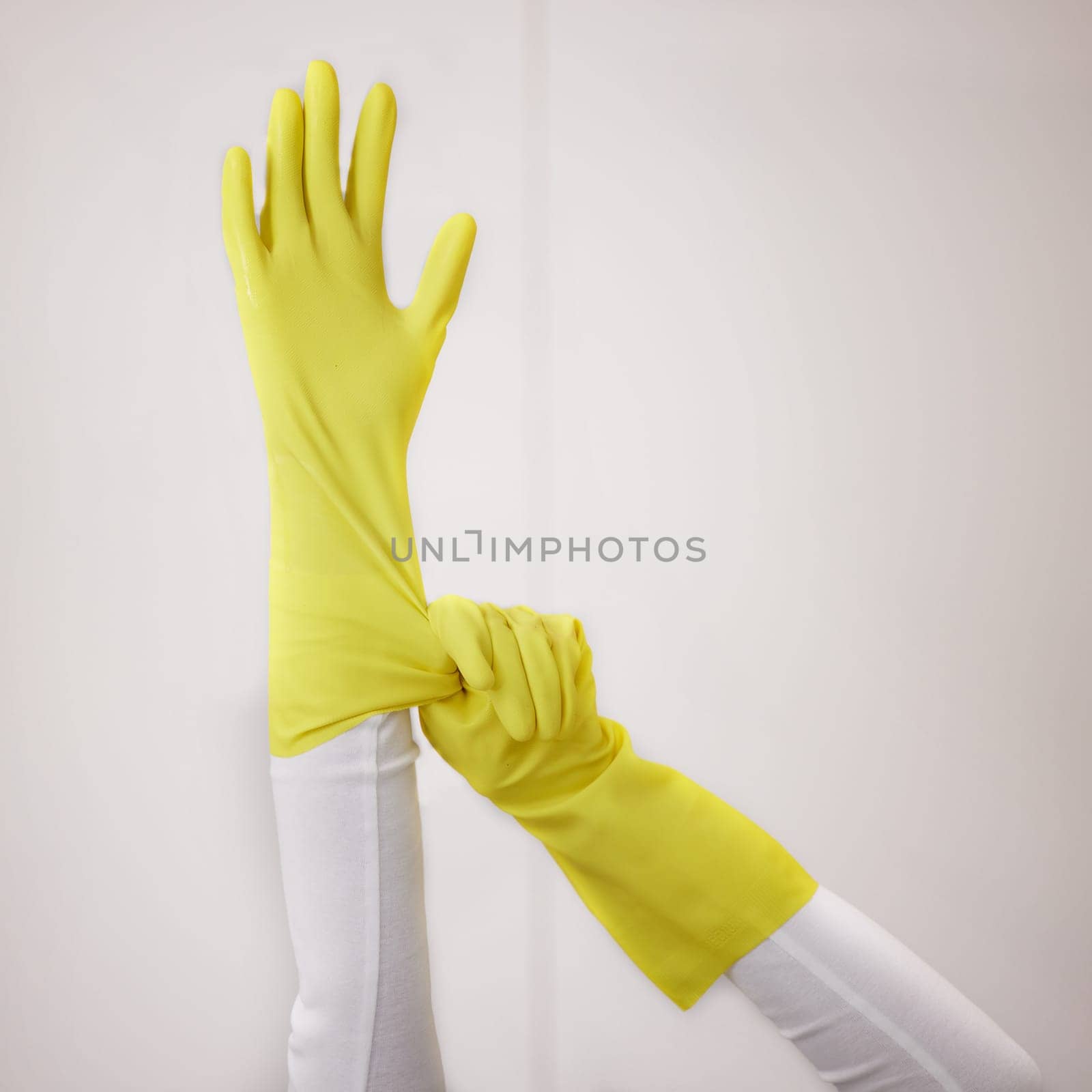 Cleaner, hands and gloves with cleaning and hygiene, safety from bacteria and germs with household disinfection. Protection, sanitize and ready to clean, person with housekeeping and maintenance by YuriArcurs