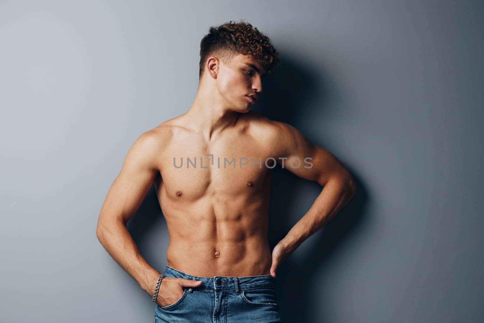 man curly background beauty standing handsome body health attractive young strong by SHOTPRIME