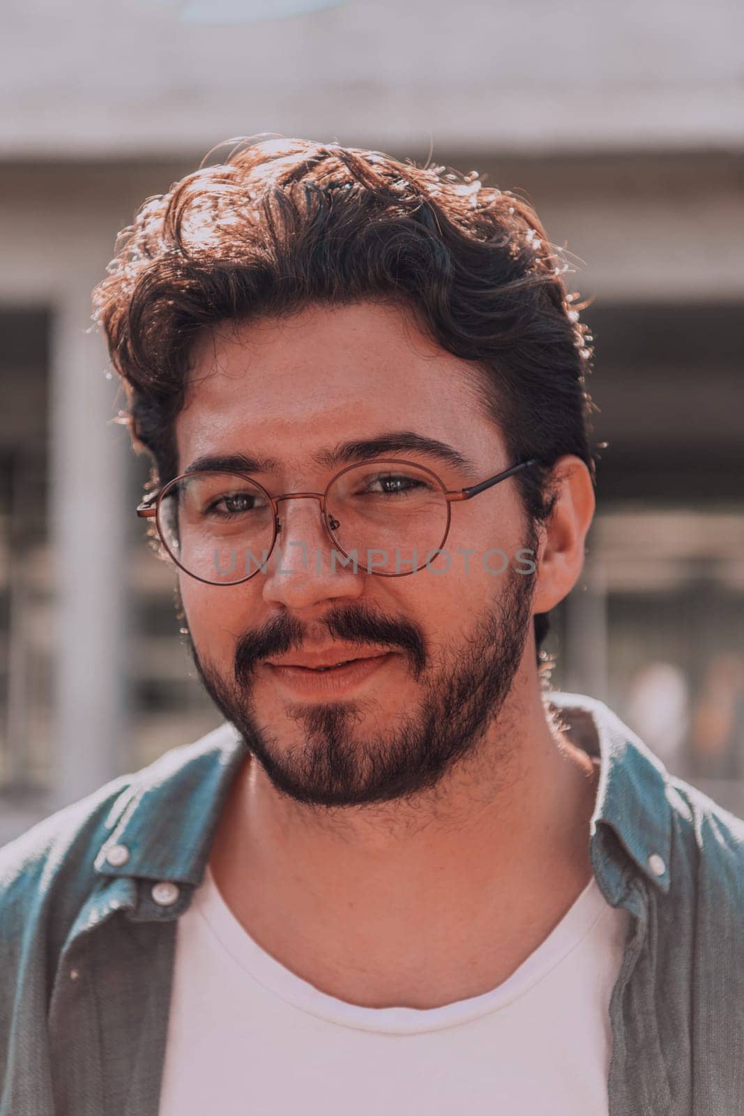 A portrait of a modern man, exuding confidence and style, against an outdoor backdrop, showcasing his charisma and fashionable demeanor. by dotshock