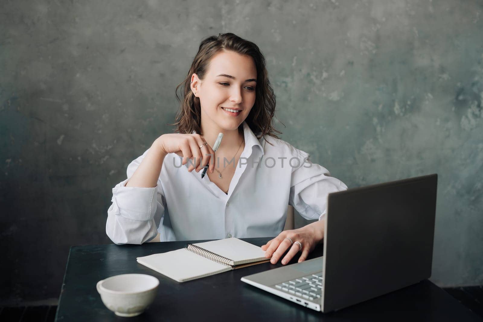 Digital Teaching: Elegant Businesswoman or Teacher Engaging in Video Conference from Office - Emphasizing Online Work and Remote Education Concepts.