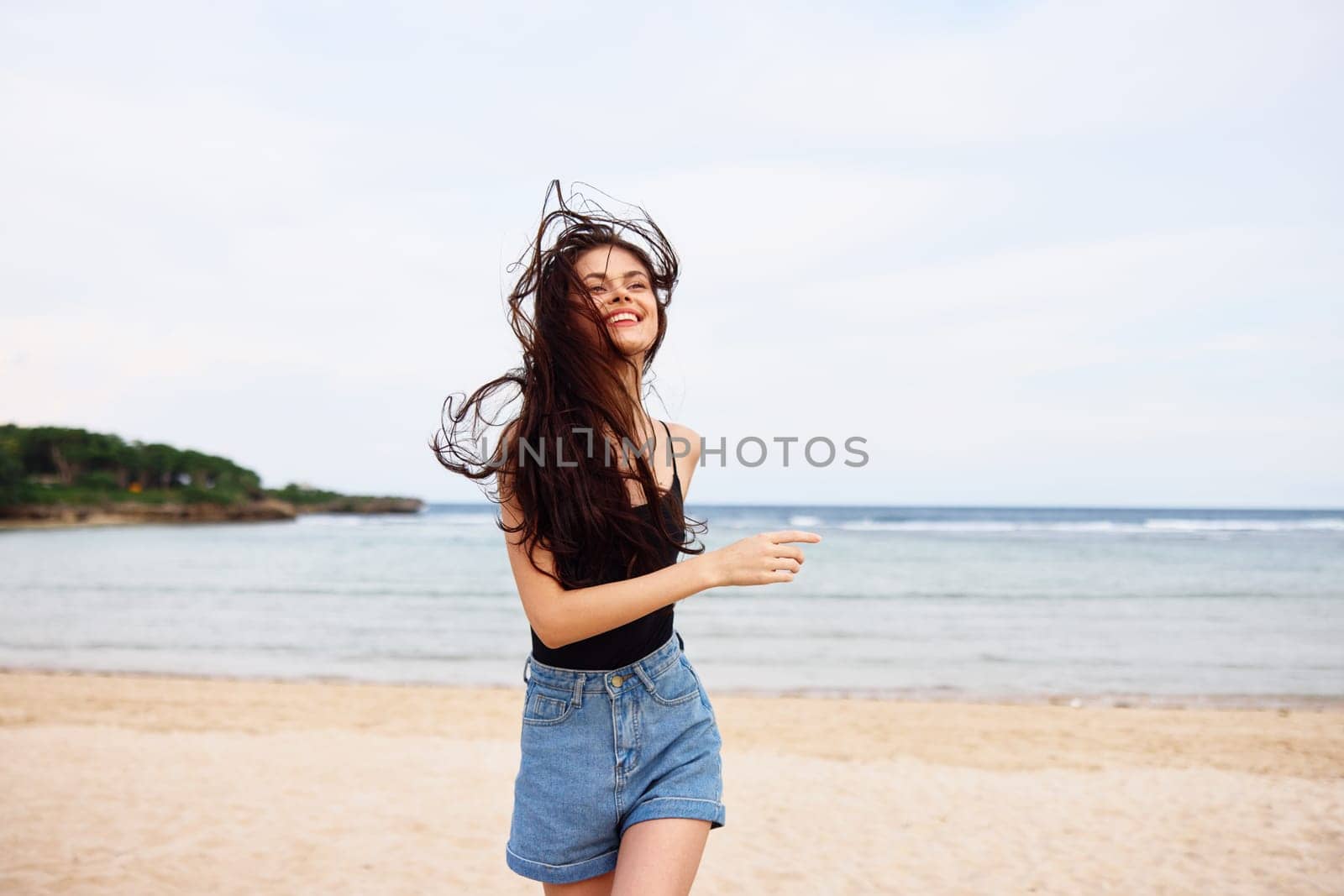 woman hair running smile sunset summer beach young travel sea lifestyle by SHOTPRIME