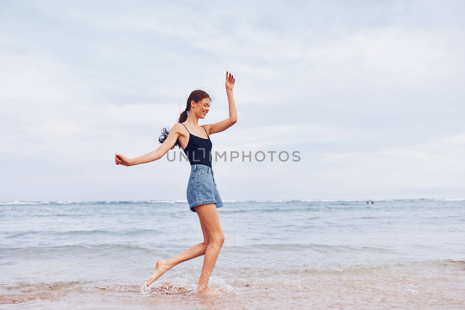 smile woman running beach young sea travel summer sunset sunrise lifestyle by SHOTPRIME