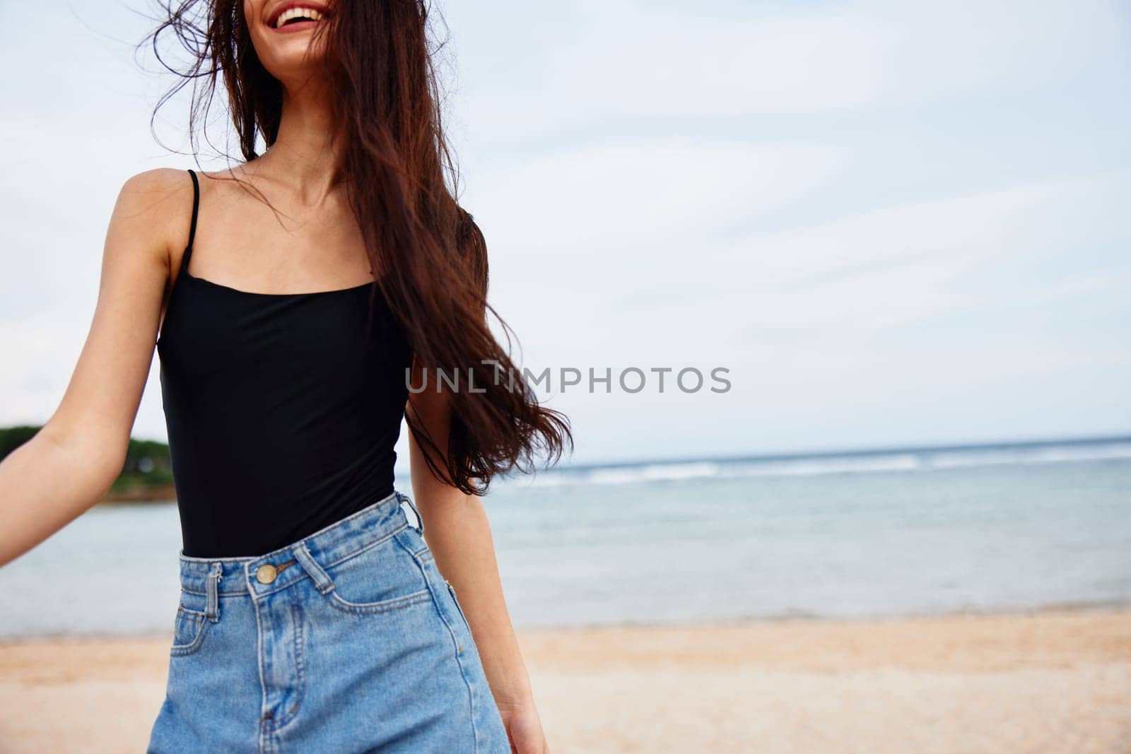 woman happiness travel running sea ocean sexy walking sunset long freedom lifestyle young active summer beautiful sun hair smiling girl beach smile