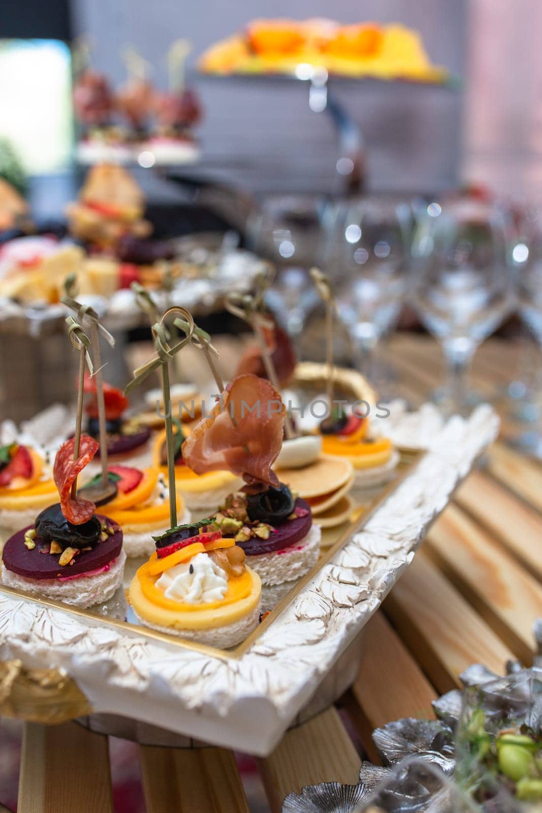 close-up of assorted canapes on the buffet table.