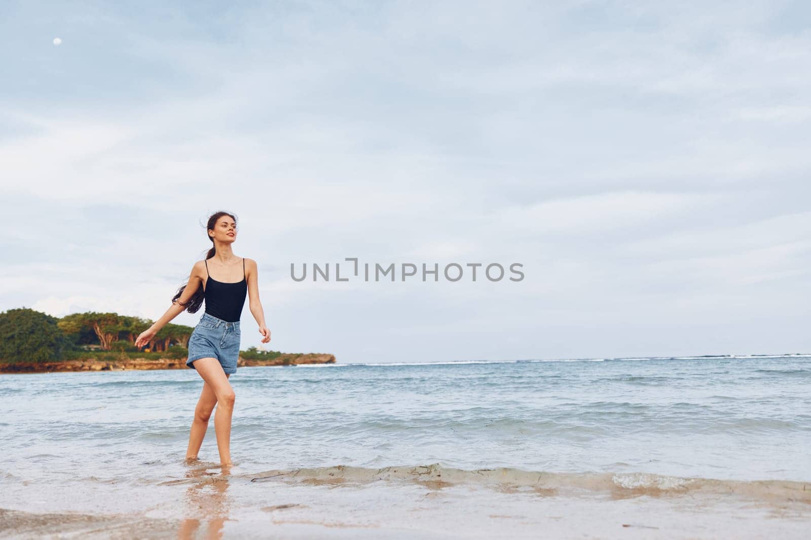 beach woman summer sunset sea young ocean smile running travel lifestyle by SHOTPRIME