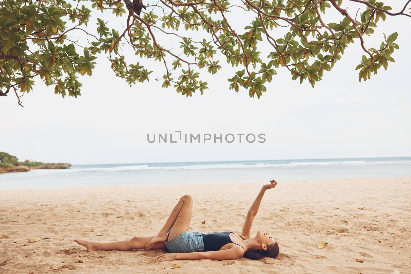 beach woman sea smile travel freedom nature beautiful sand vacation sitting by SHOTPRIME