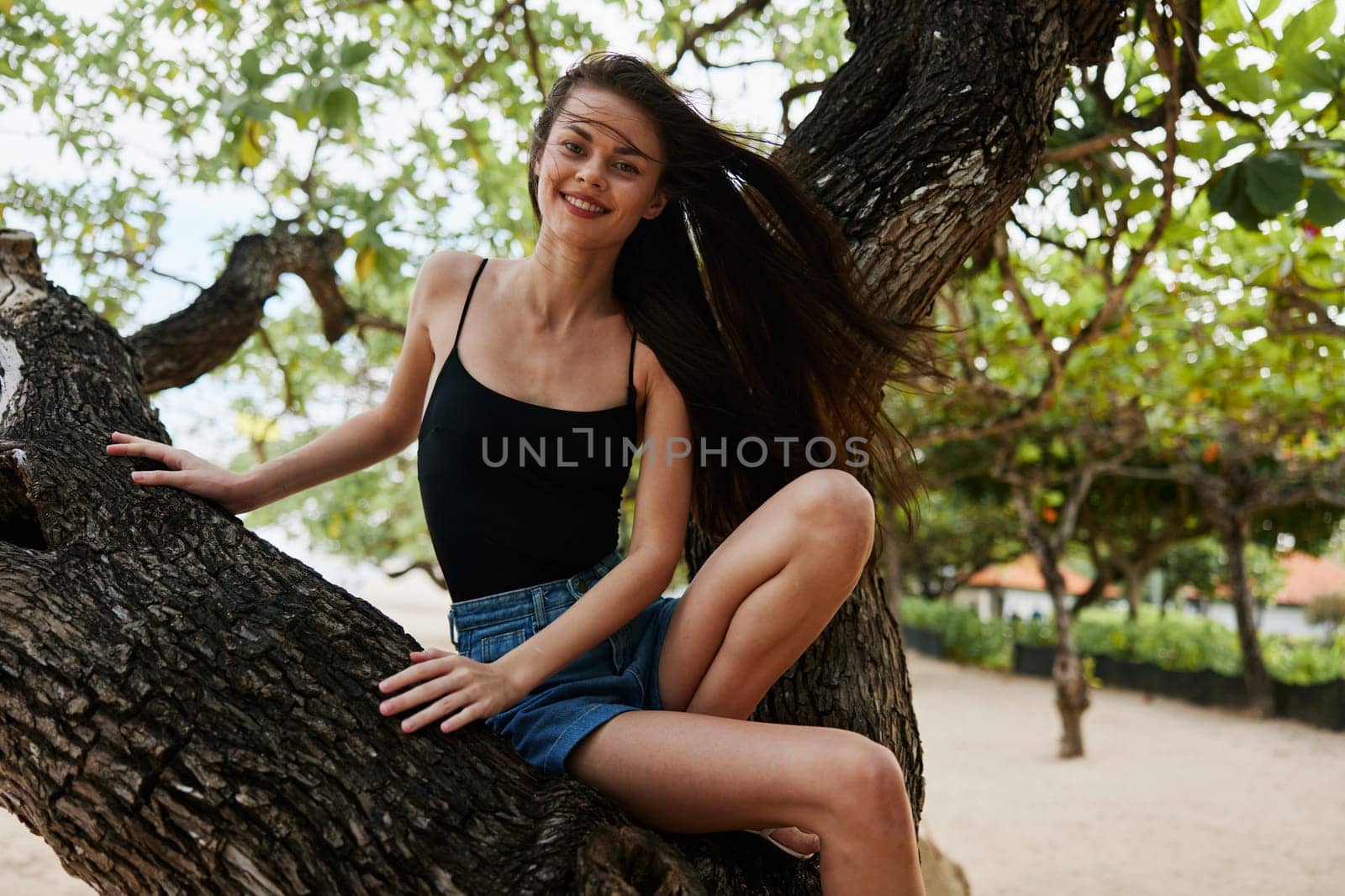 woman lifestyle smiling sitting relax girl sky vacation sea tree nature by SHOTPRIME