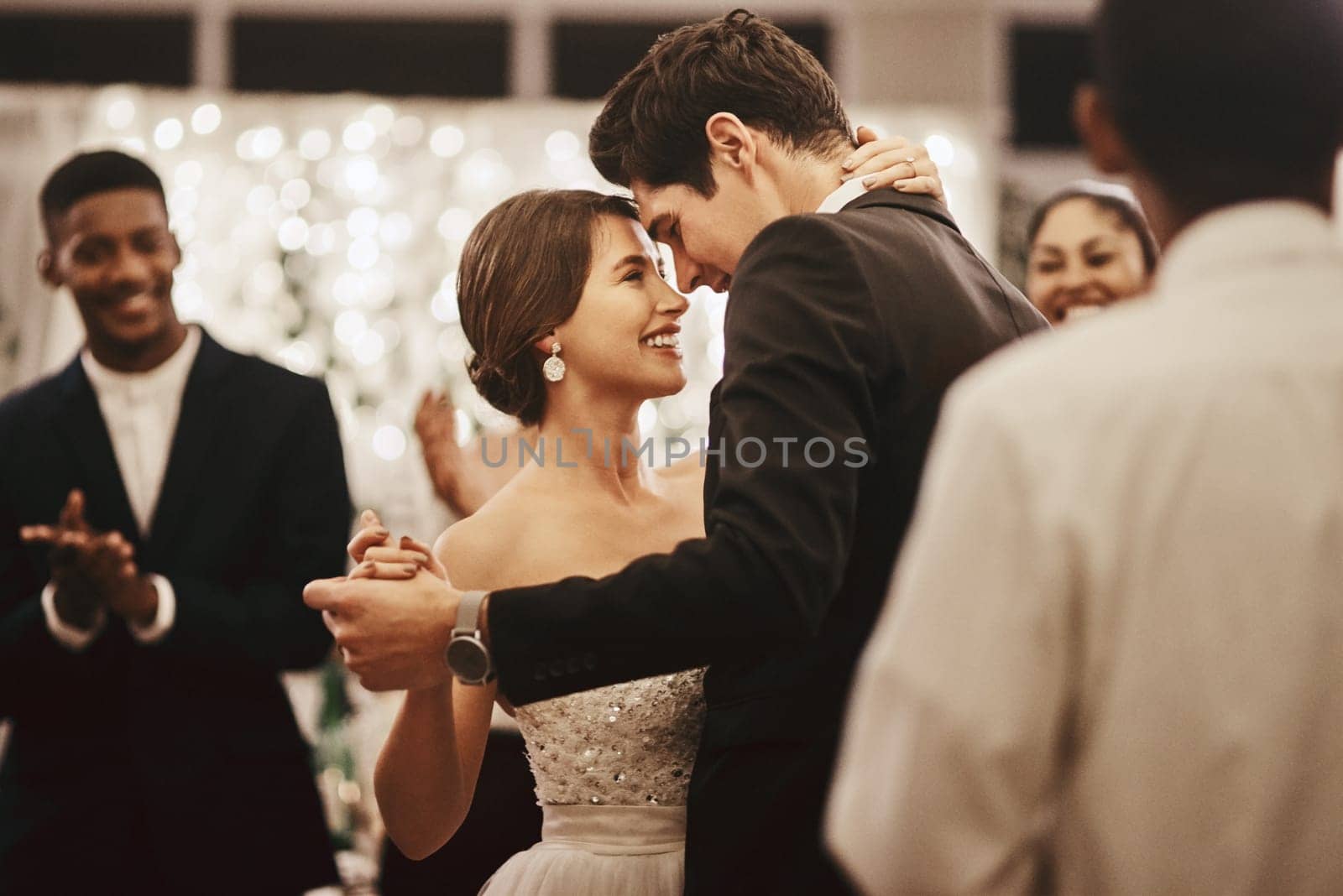 Love, wedding and happy couple doing a dance together for tradition at a marriage reception. Happiness, smile and young husband and wife dancing with intimacy at ceremony party, event or celebration