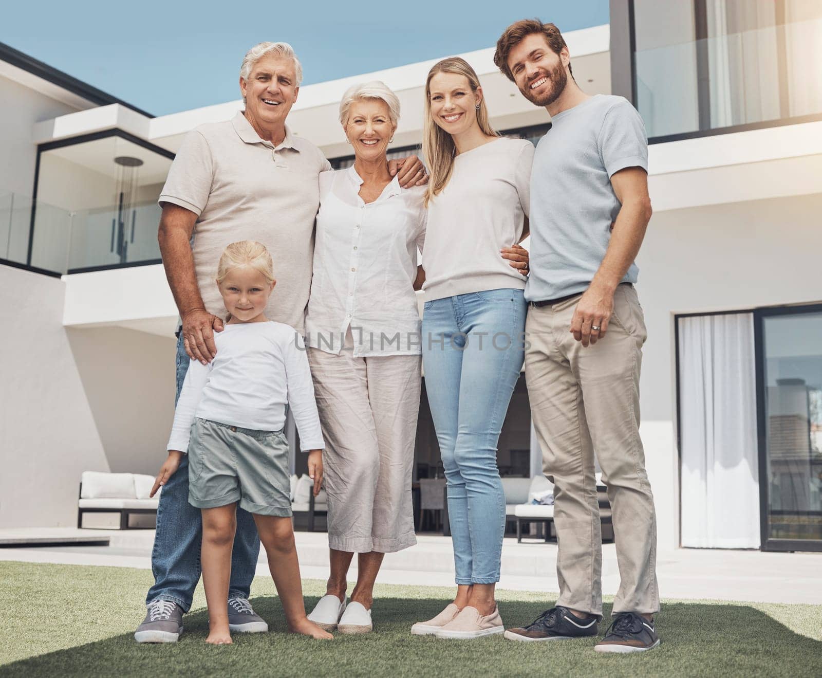 Senior family, parents and child backyard at luxury house, property or real estate in happy group portrait. Love, home and people or elderly grandmother, father with kids for investment or retirement.