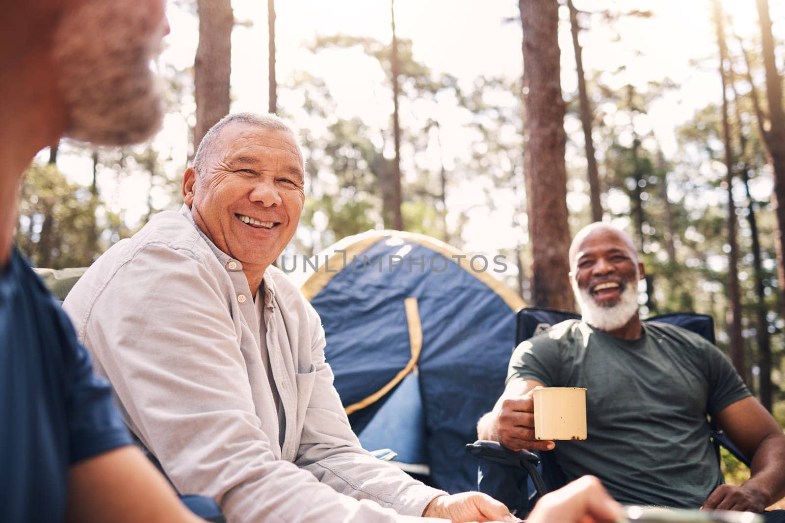 Camping, trekking and senior men in the mountains for retirement travel and bonding in Switzerland. Relax, laughing and elderly friends speaking while on a camp for an adventure and holiday in nature.
