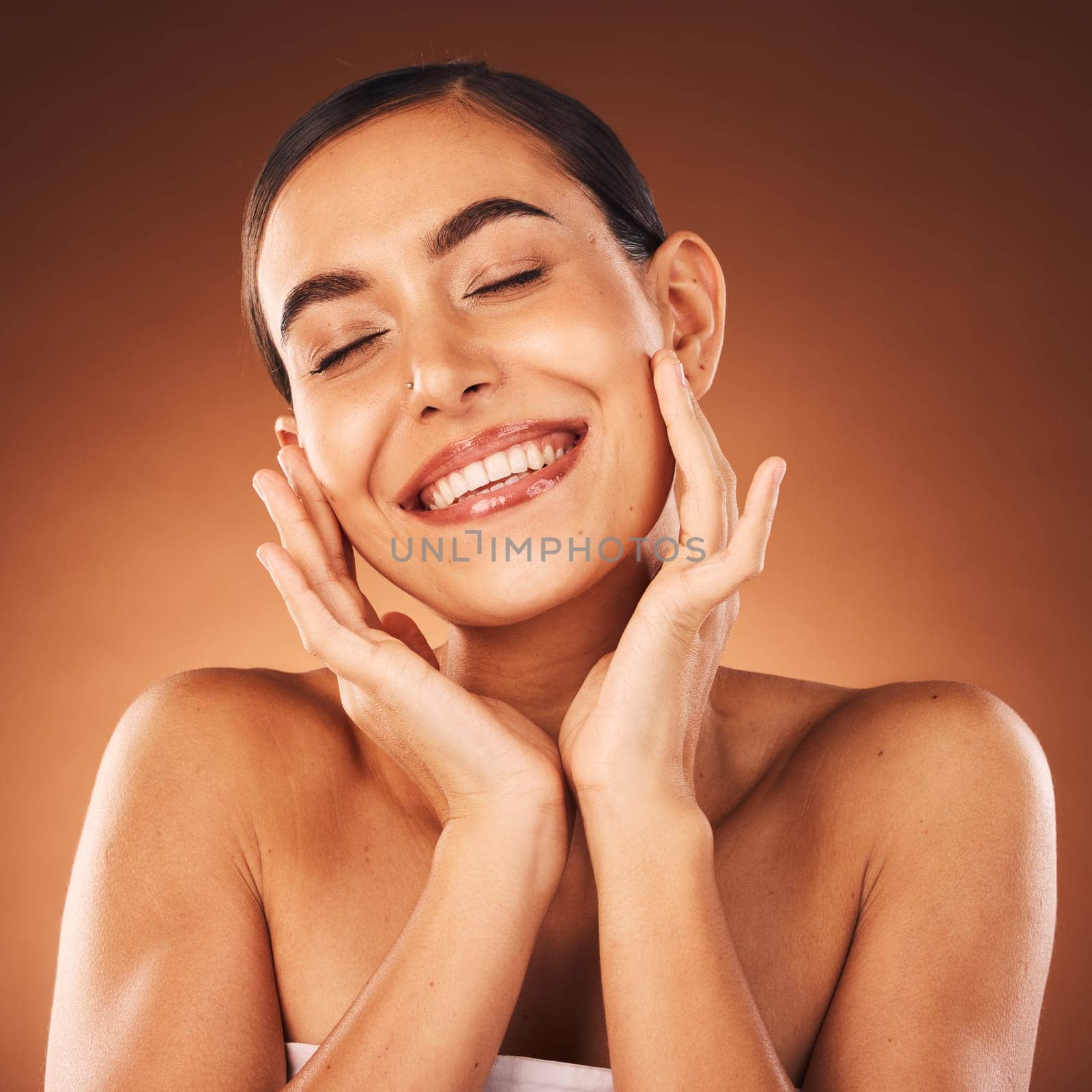 Beauty, face and skincare with smile on woman for natural cosmetics and glow against studio background. Facial, treatment and make up with skin care mock up for healthy skin wellness and cosmetic