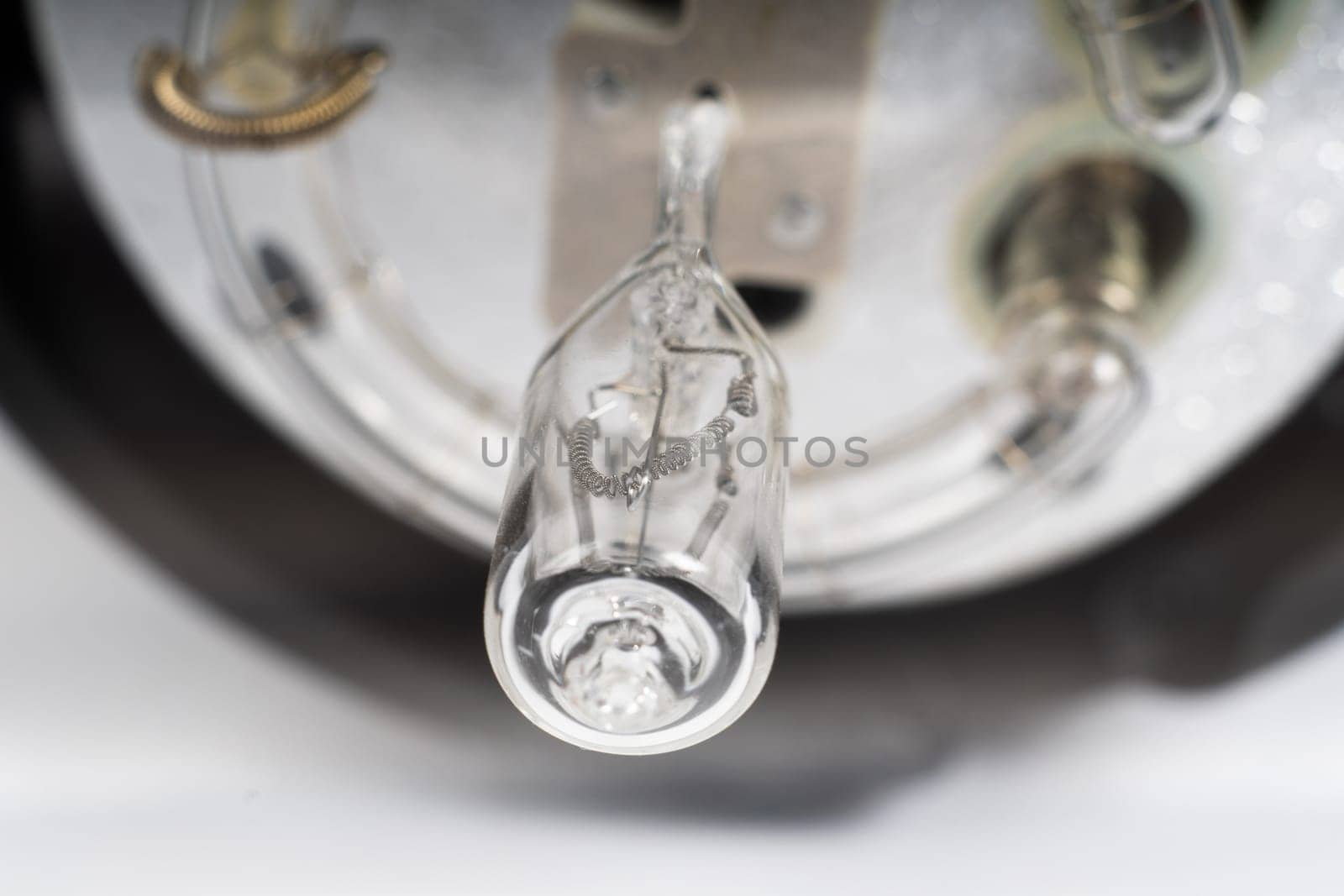 Studio light flash lamp closeup on a white background isolated